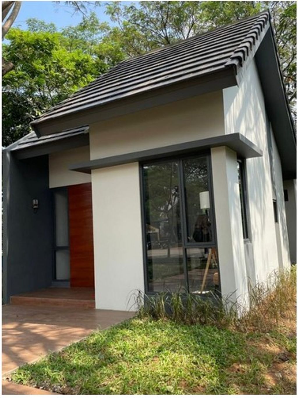 foto tampak rumah tipe FRESIA LITE 583 perumahan Mutiara Gading City Cluster New Liverpool Tahap 1