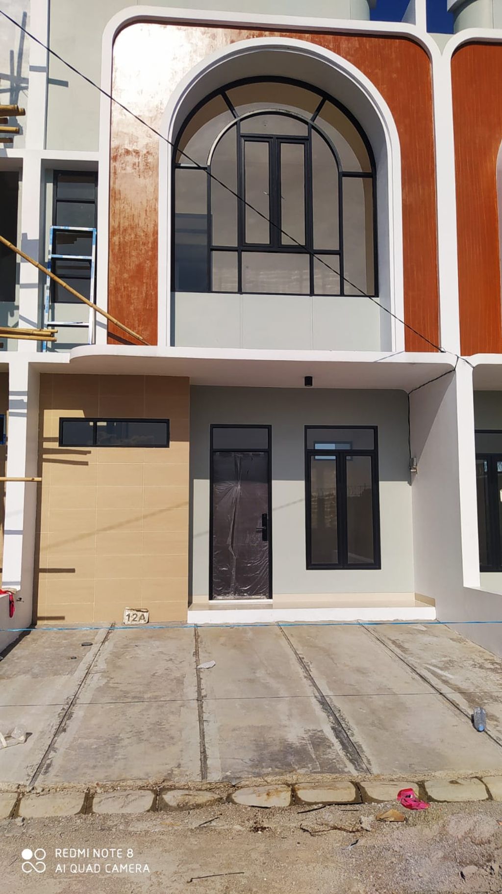 foto tampak rumah tipe 51 Compact 3 Kamar HC (551) perumahan G-Land Ciwastra Park 2