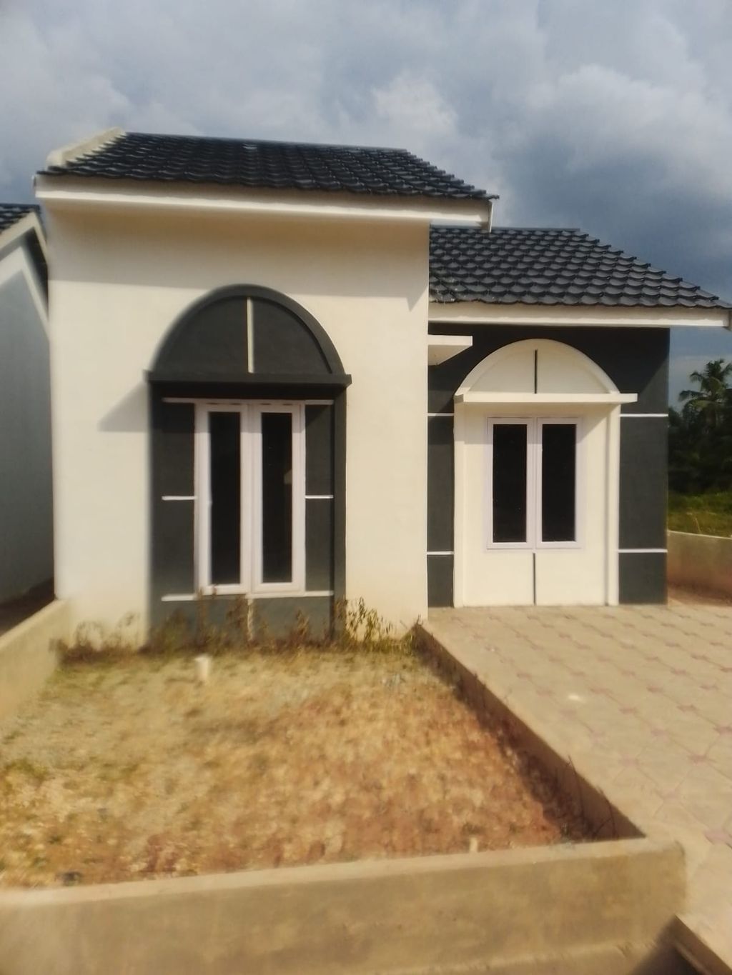 foto tampak rumah tipe 36 RSH perumahan BERLIANA ASRI