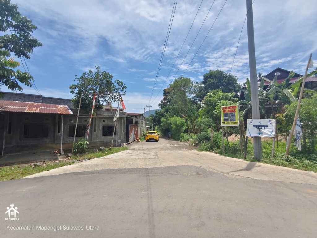 foto gerbang perumahan CITRALOKA BUHA 2