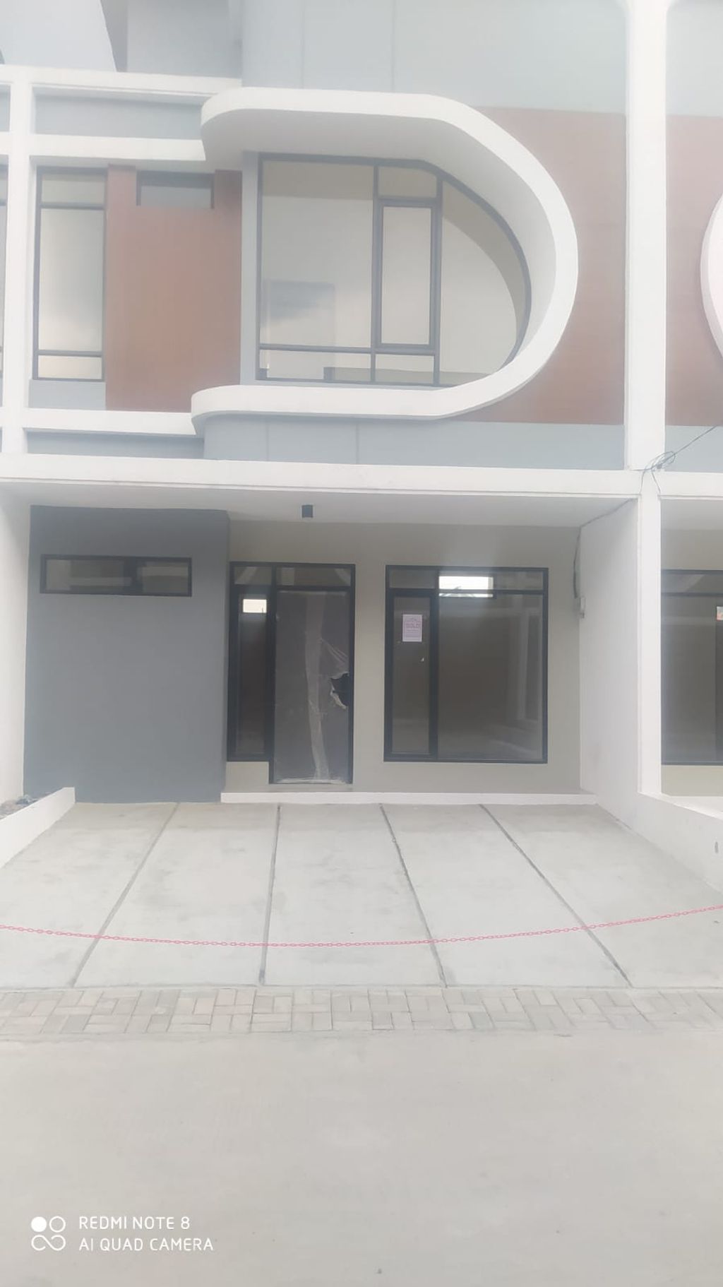 foto tampak rumah tipe 57 Compact High Ceiling (3KT) (644) perumahan G-Land Ciwastra Park 2