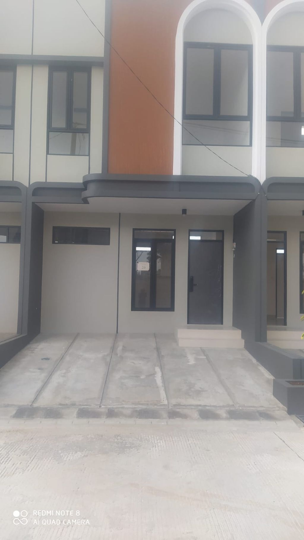 foto tampak rumah tipe 38 Compact 2 Kamar HC (461) perumahan G-Land Ciwastra Park 2