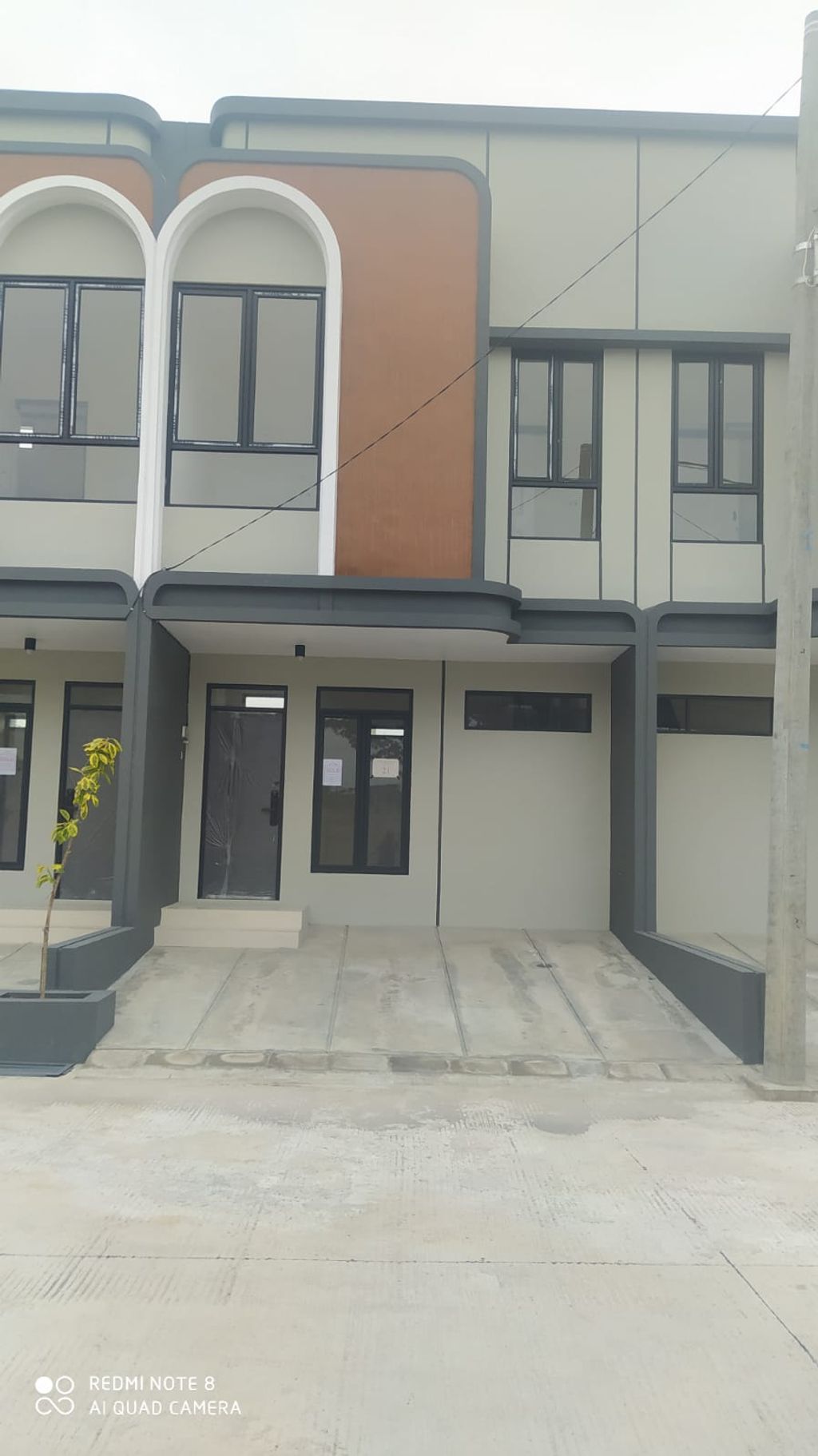 foto tampak rumah tipe 38 Compact 2 Kamar HC (461) perumahan G-Land Ciwastra Park 2