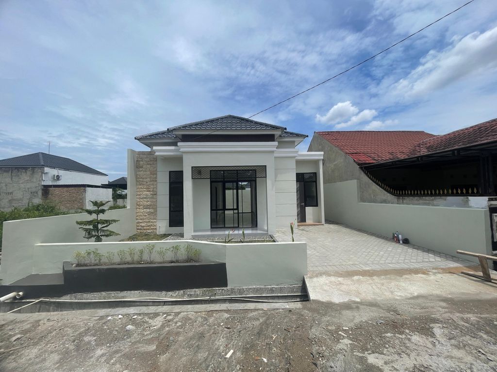 foto tampak rumah tipe RBP 70 perumahan Graha Deli Permai Cluster Rasyid Bumi Permai