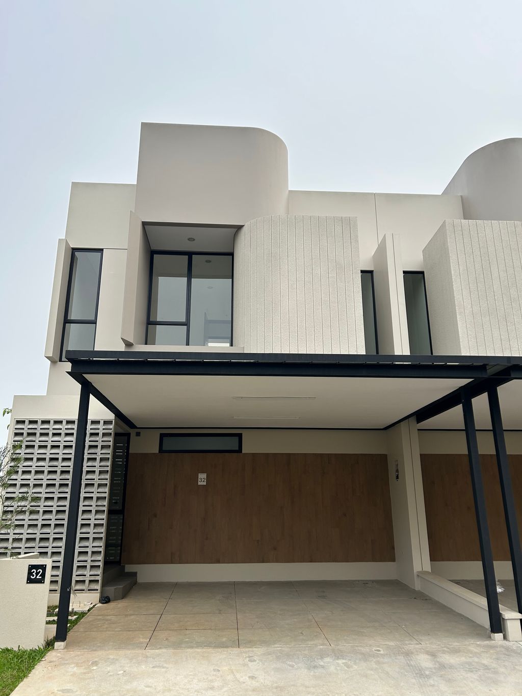 foto tampak rumah tipe BURNET perumahan CLUSTER BASANTA, SUVARNA SUTERA