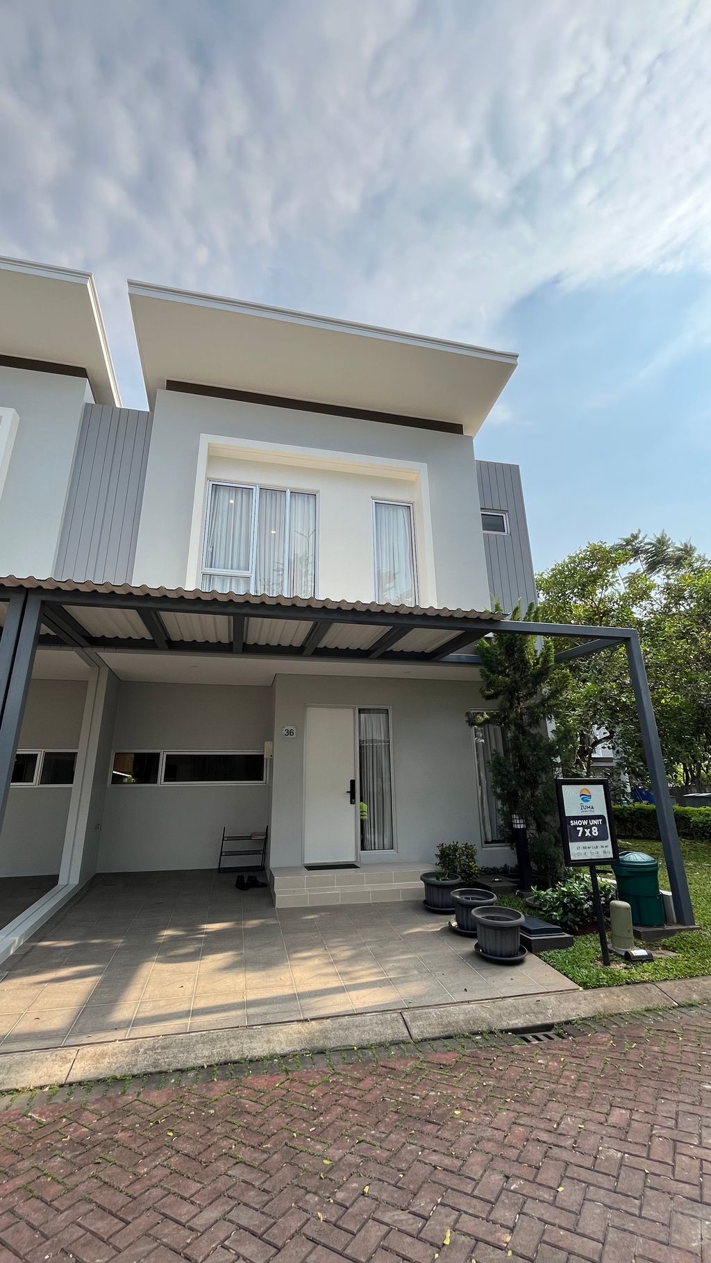 foto tampak rumah tipe MARVISTA/36 perumahan CLUSTER MALIBU VILLAGE