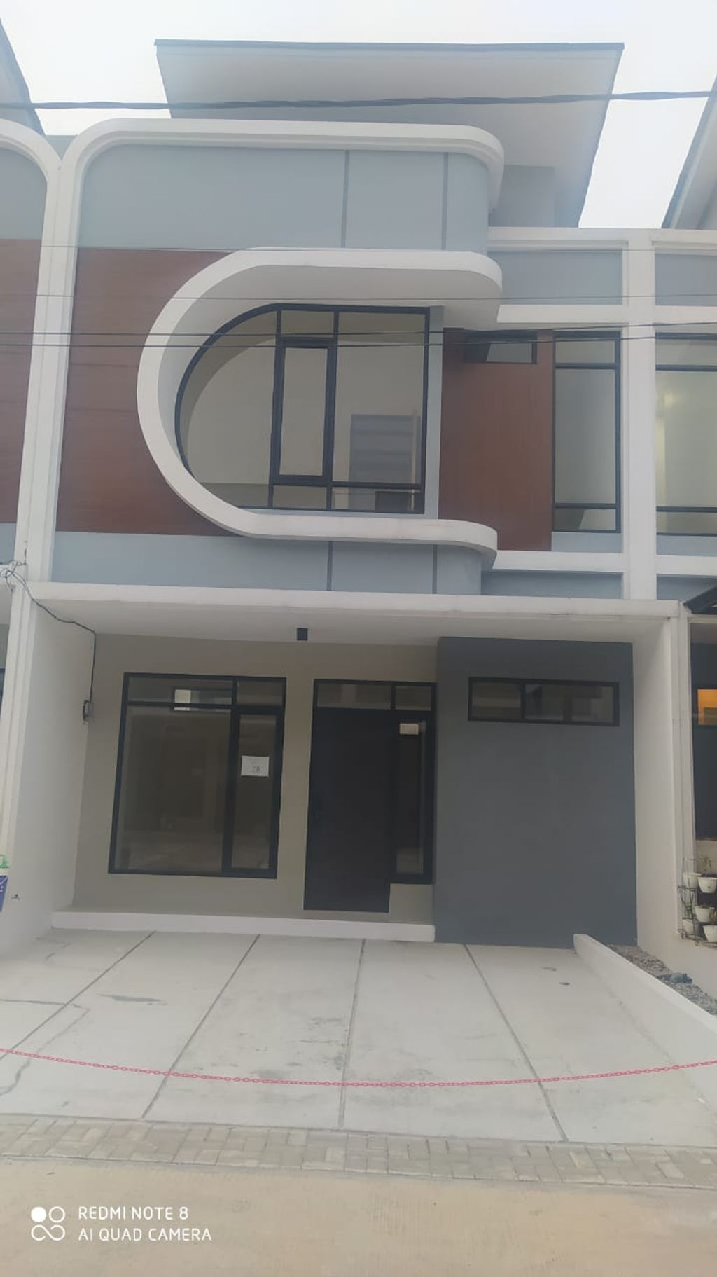 foto tampak rumah tipe 57 Compact High Ceiling (3KT) (644) perumahan G-Land Ciwastra Park 2