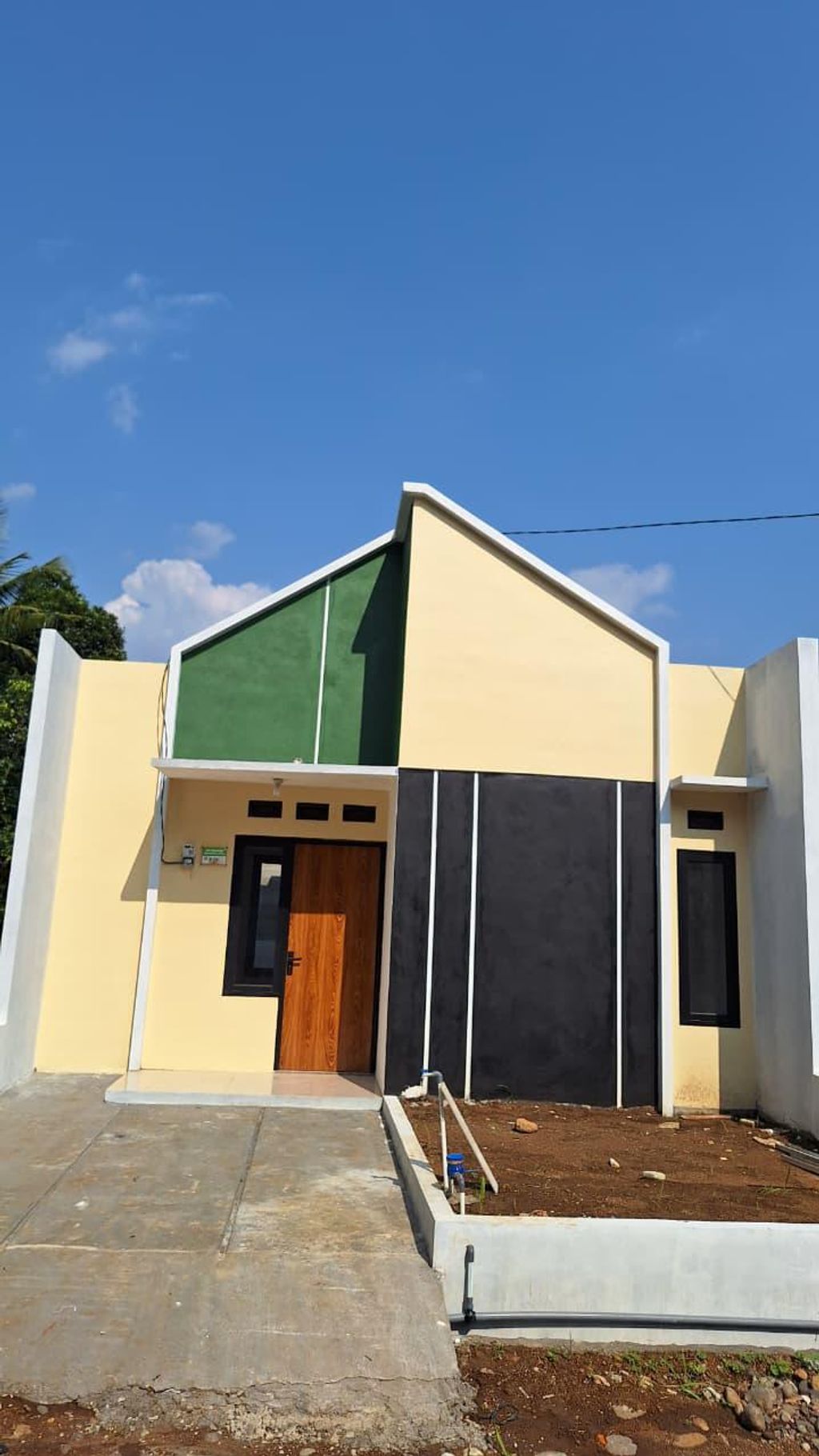 foto tampak rumah tipe scandinavian perumahan Smart brilliant regency