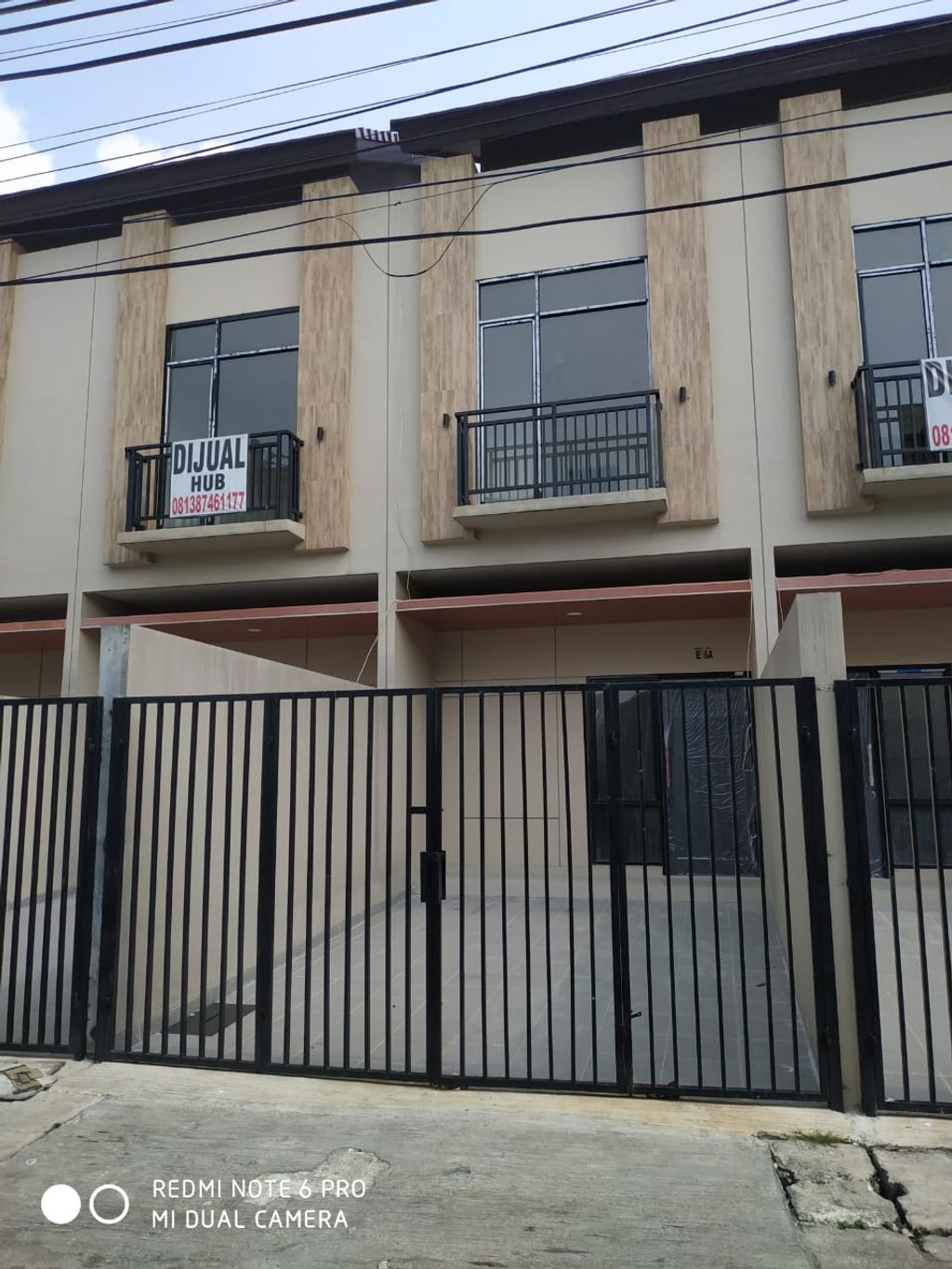 foto tampak rumah tipe 98/67 perumahan Klingkit Raya Residence