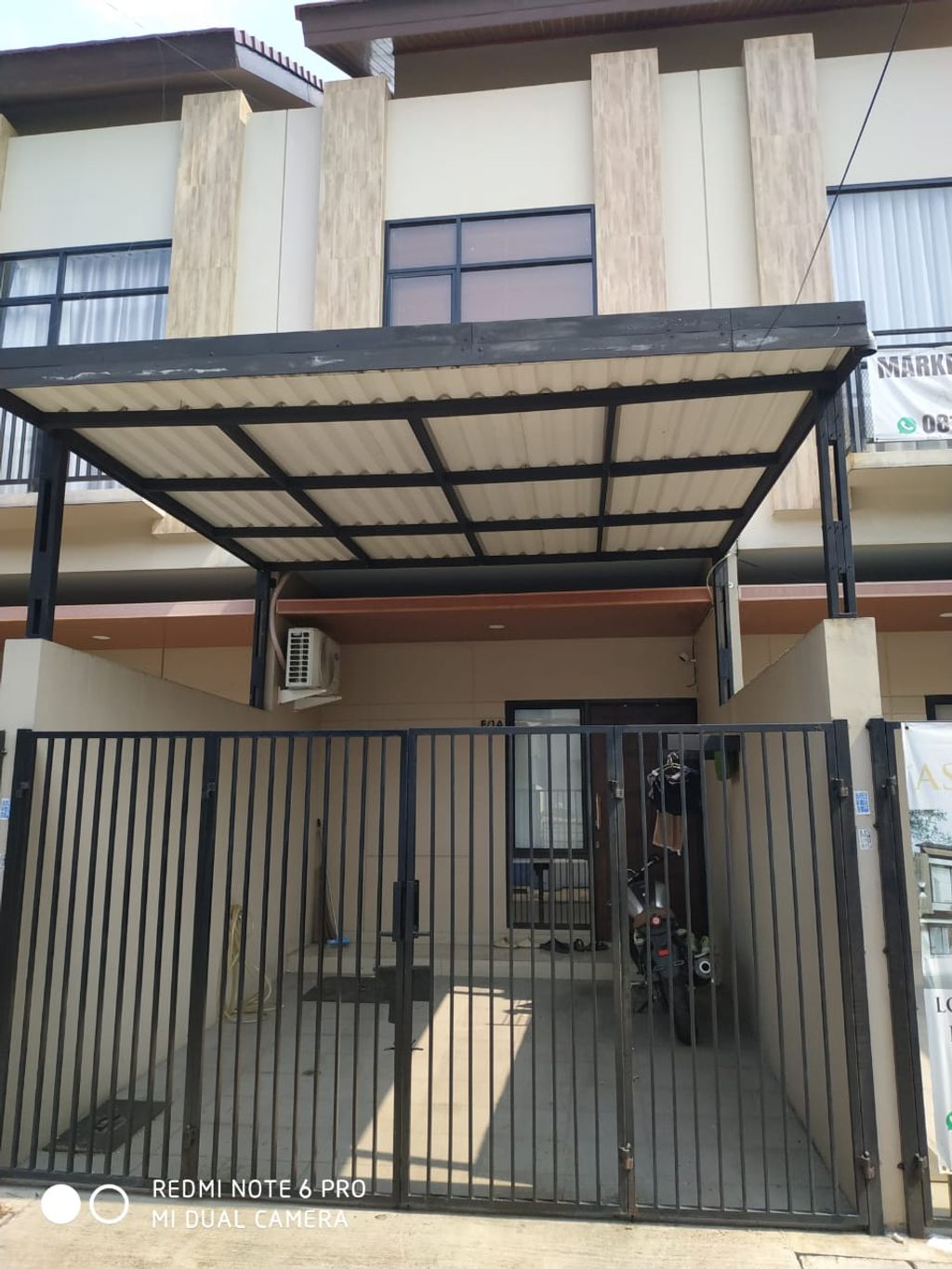 foto tampak rumah tipe 98/62 perumahan Klingkit Raya Residence