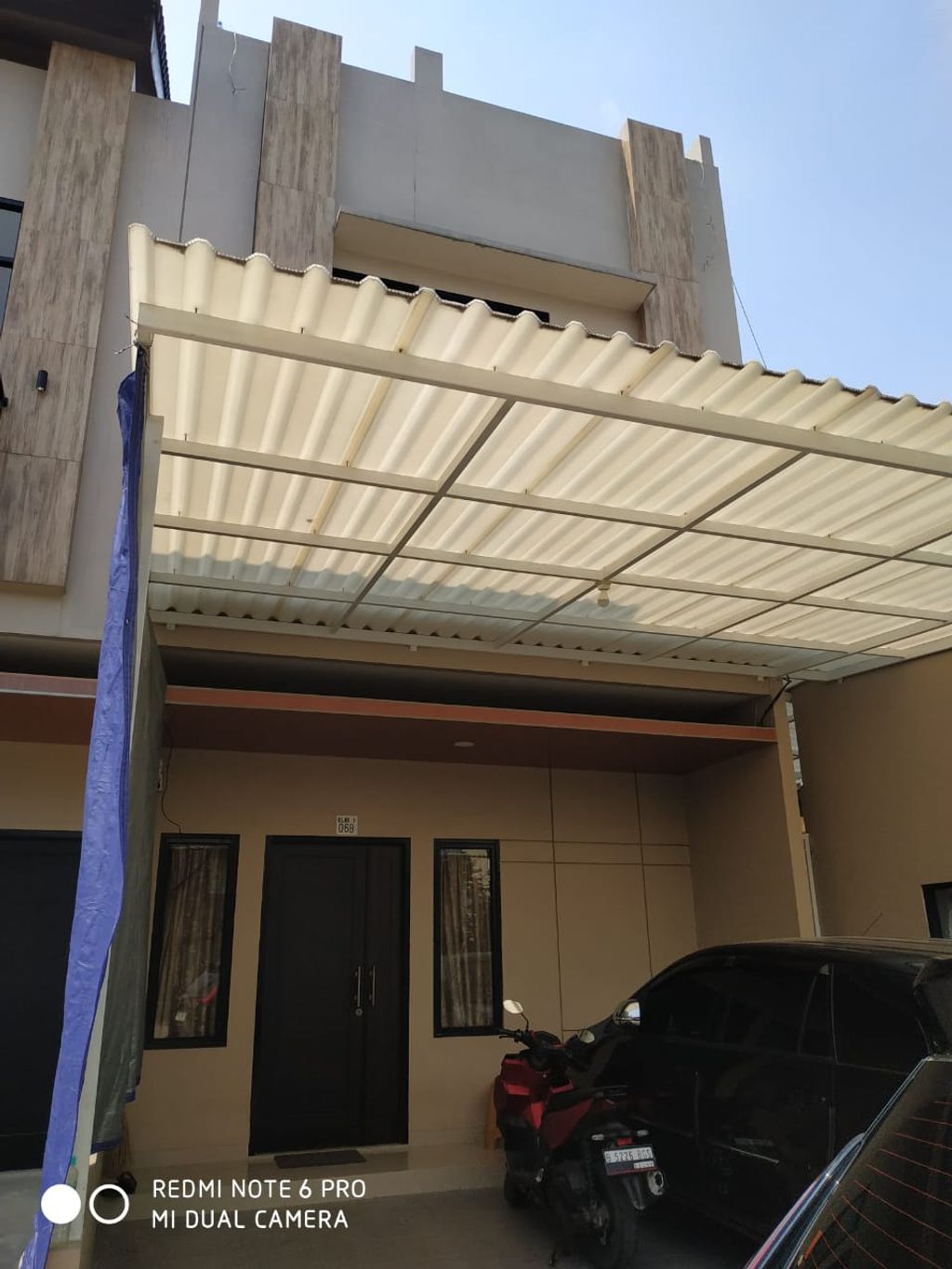 foto tampak rumah tipe 110/83 perumahan Klingkit Raya Residence