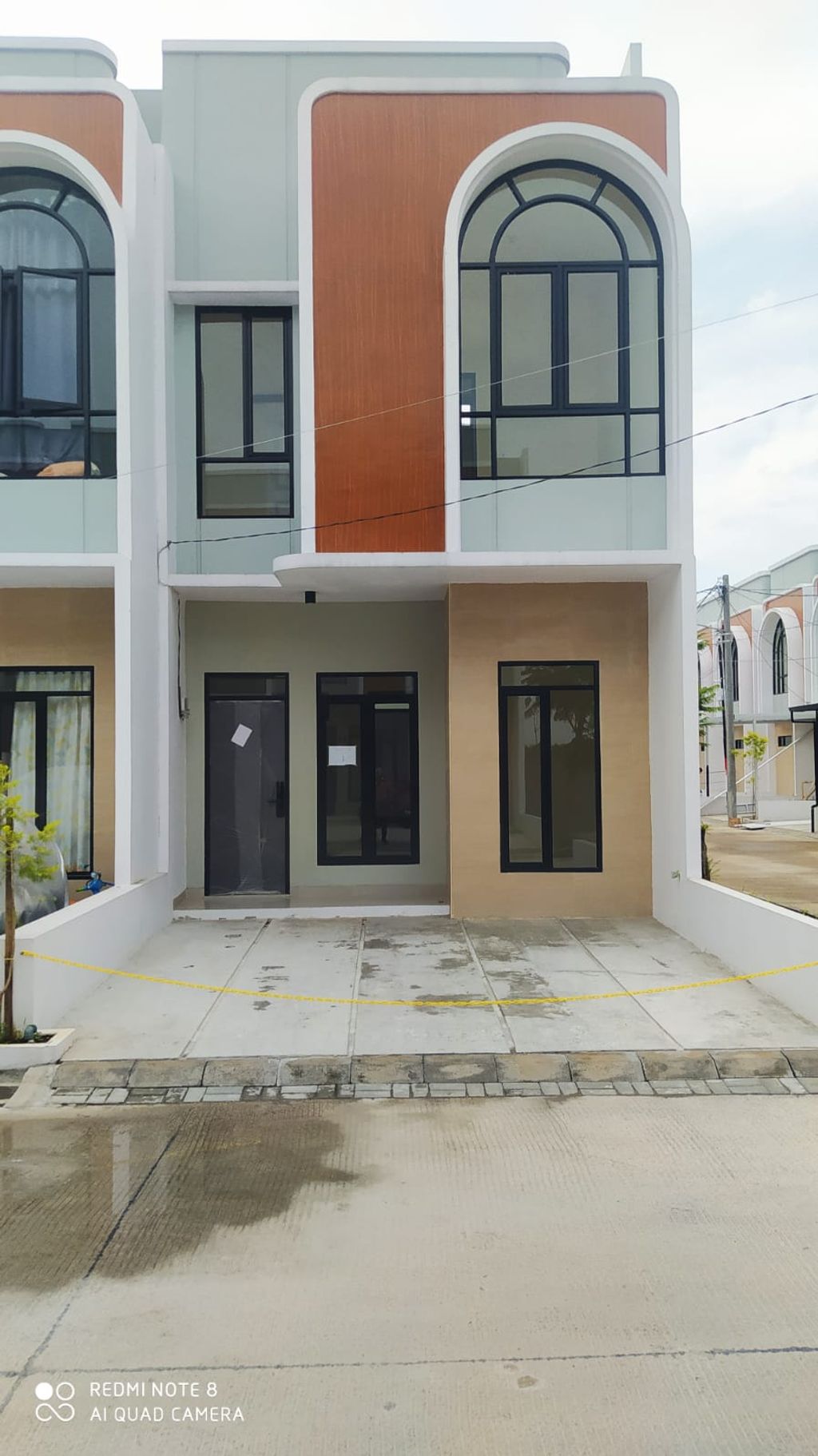foto tampak rumah tipe 43 Compact 3 Kamar HC (504) perumahan G-Land Ciwastra Park 2