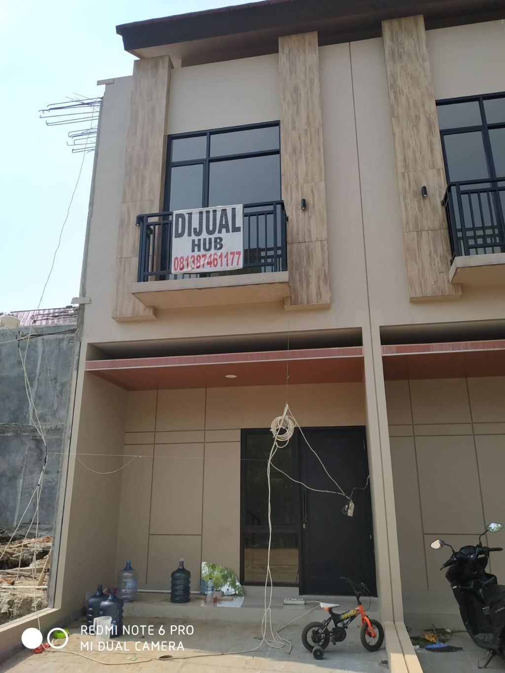 foto tampak rumah tipe 98/60 perumahan Klingkit Raya Residence