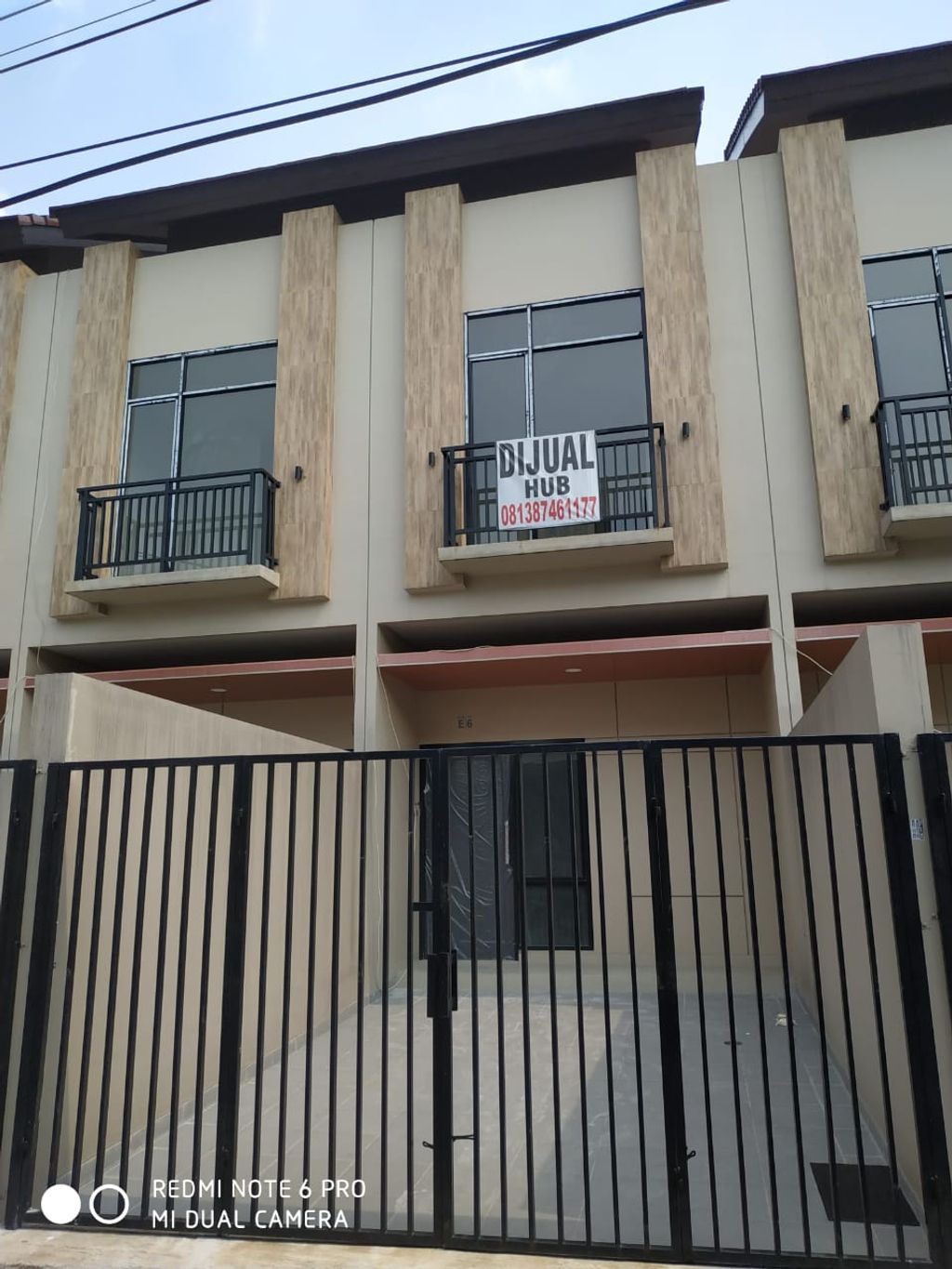 foto tampak rumah tipe 98/66 perumahan Klingkit Raya Residence