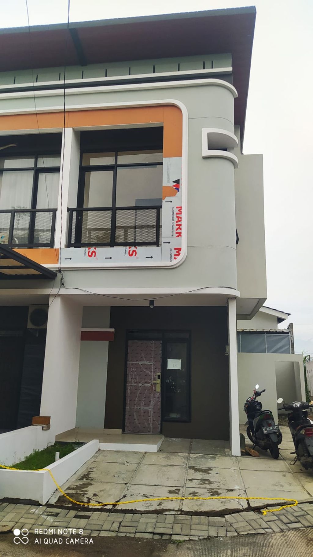 foto tampak rumah tipe 47 Compact (3 kamar) (436) perumahan G-Land Ciwastra Park 2