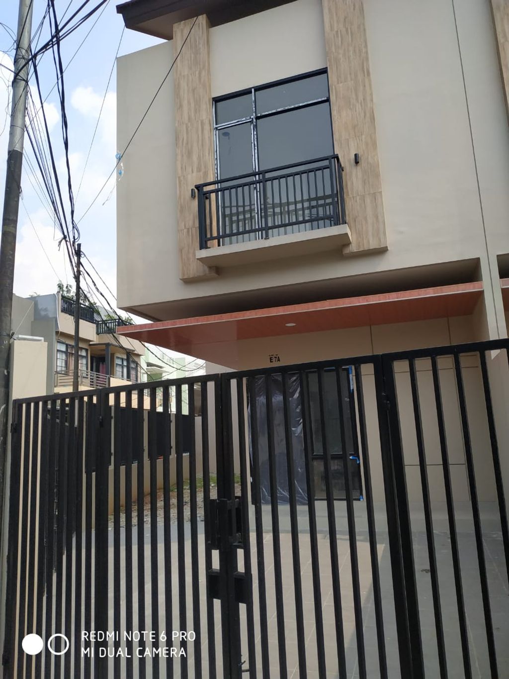 foto tampak rumah tipe 118/123 perumahan Klingkit Raya Residence