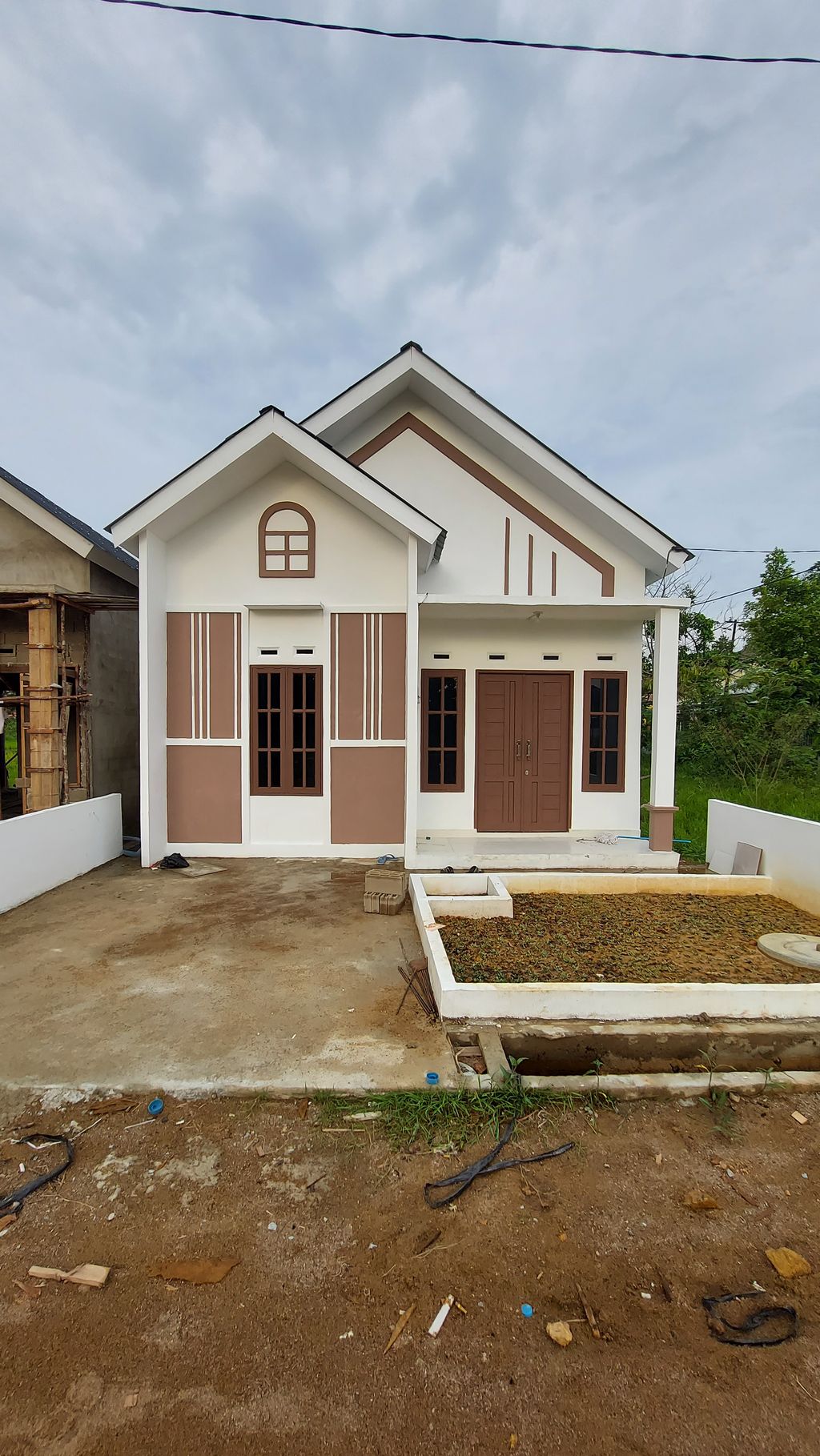 foto tampak rumah tipe SAKOFA 36 perumahan SAKOFA SABAR SEJAHTERA