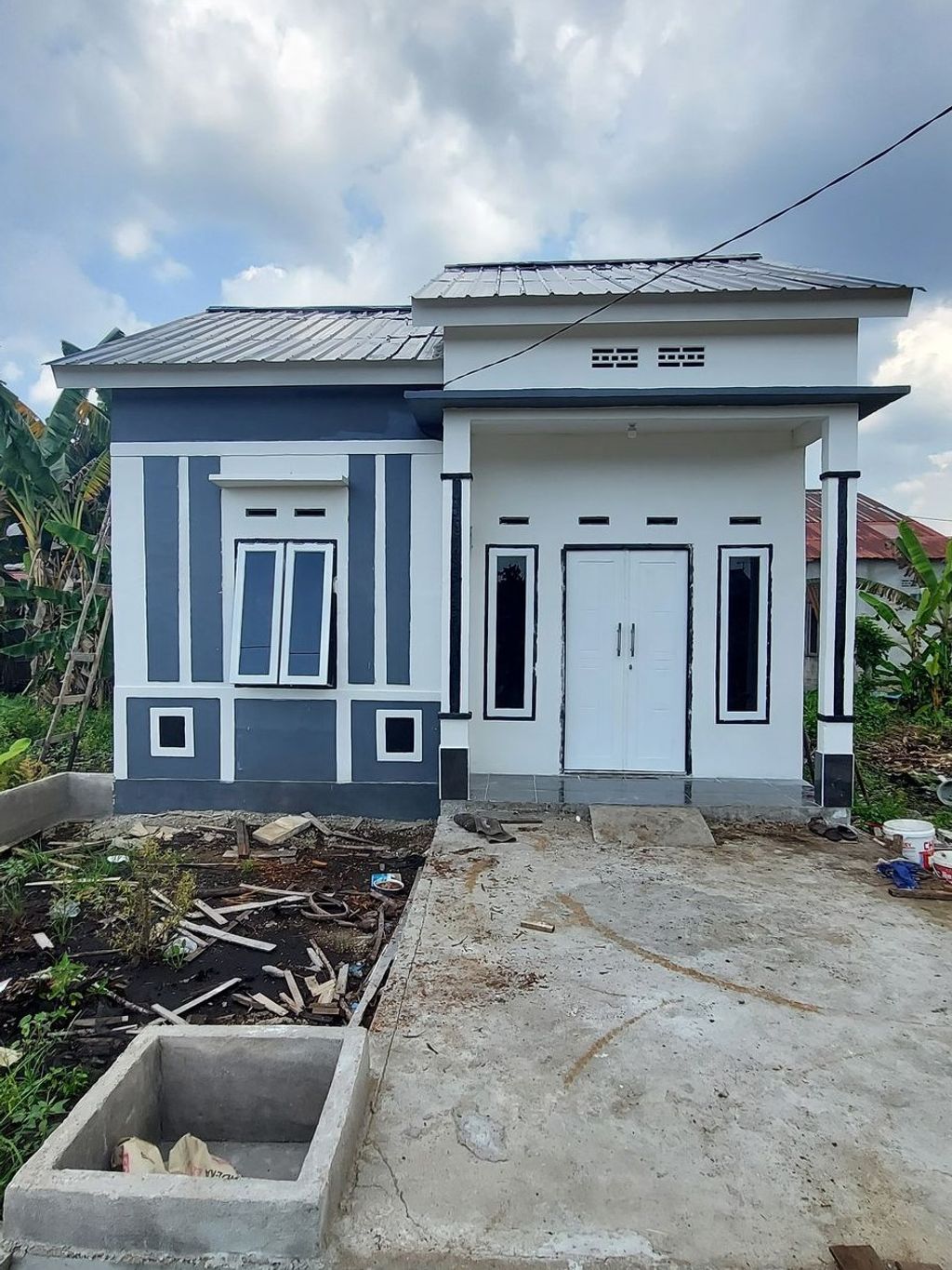 foto tampak rumah tipe Harman 36 perumahan HARMAN KHATULISTIWA