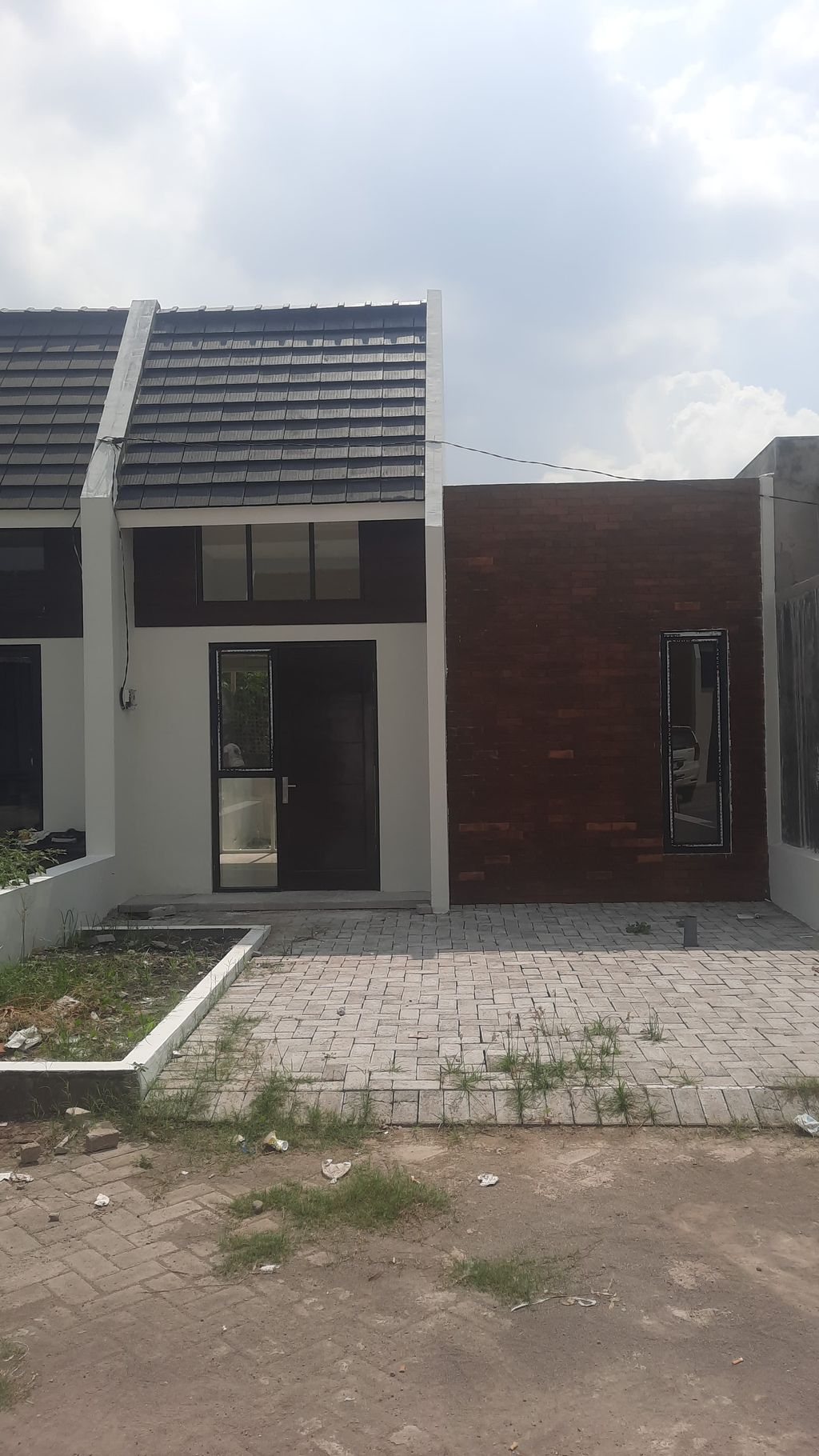 foto tampak rumah tipe 30/84 perumahan Green Jayanegara Residence