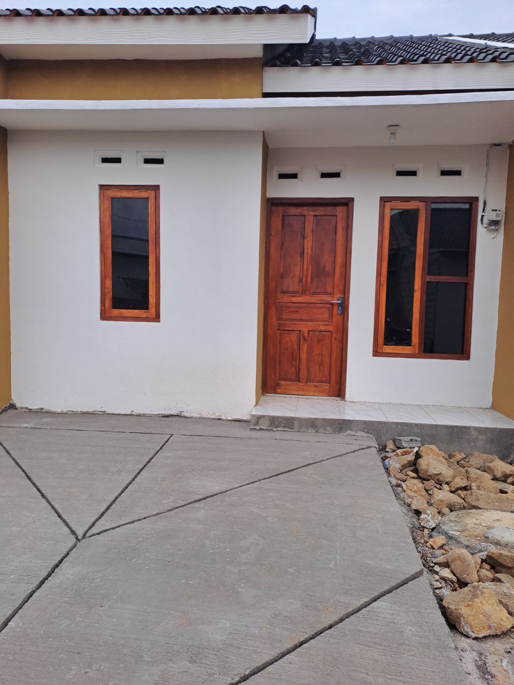 foto tampak rumah tipe 30/60 perumahan PERUMAHAN GRAHA ASRI TAMANGEDE