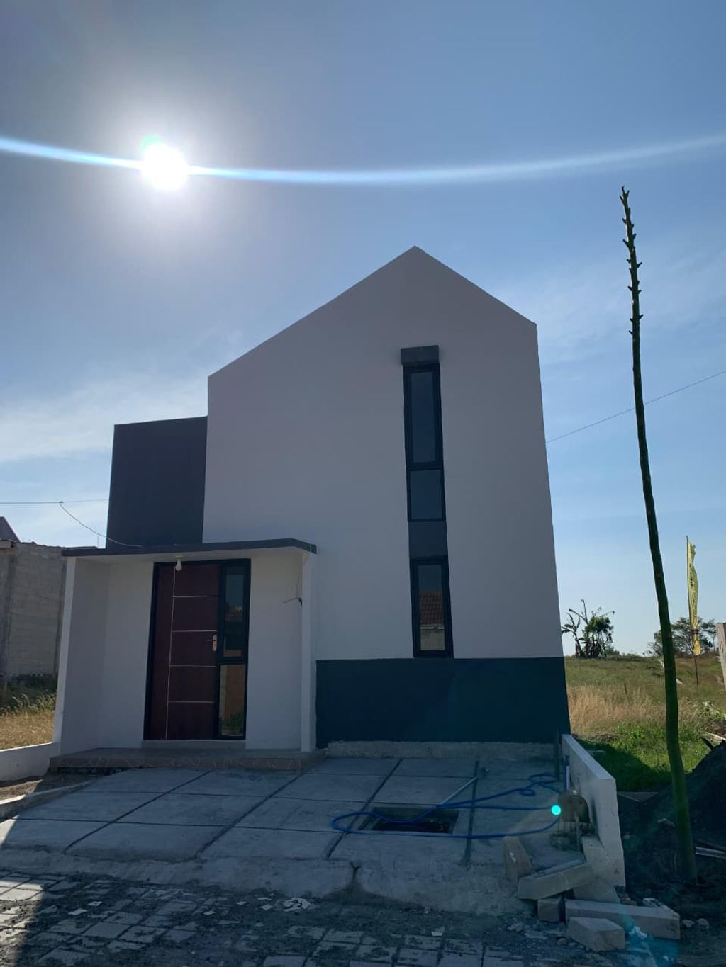 foto tampak rumah tipe Sadia+ perumahan Griya Madureso Asri