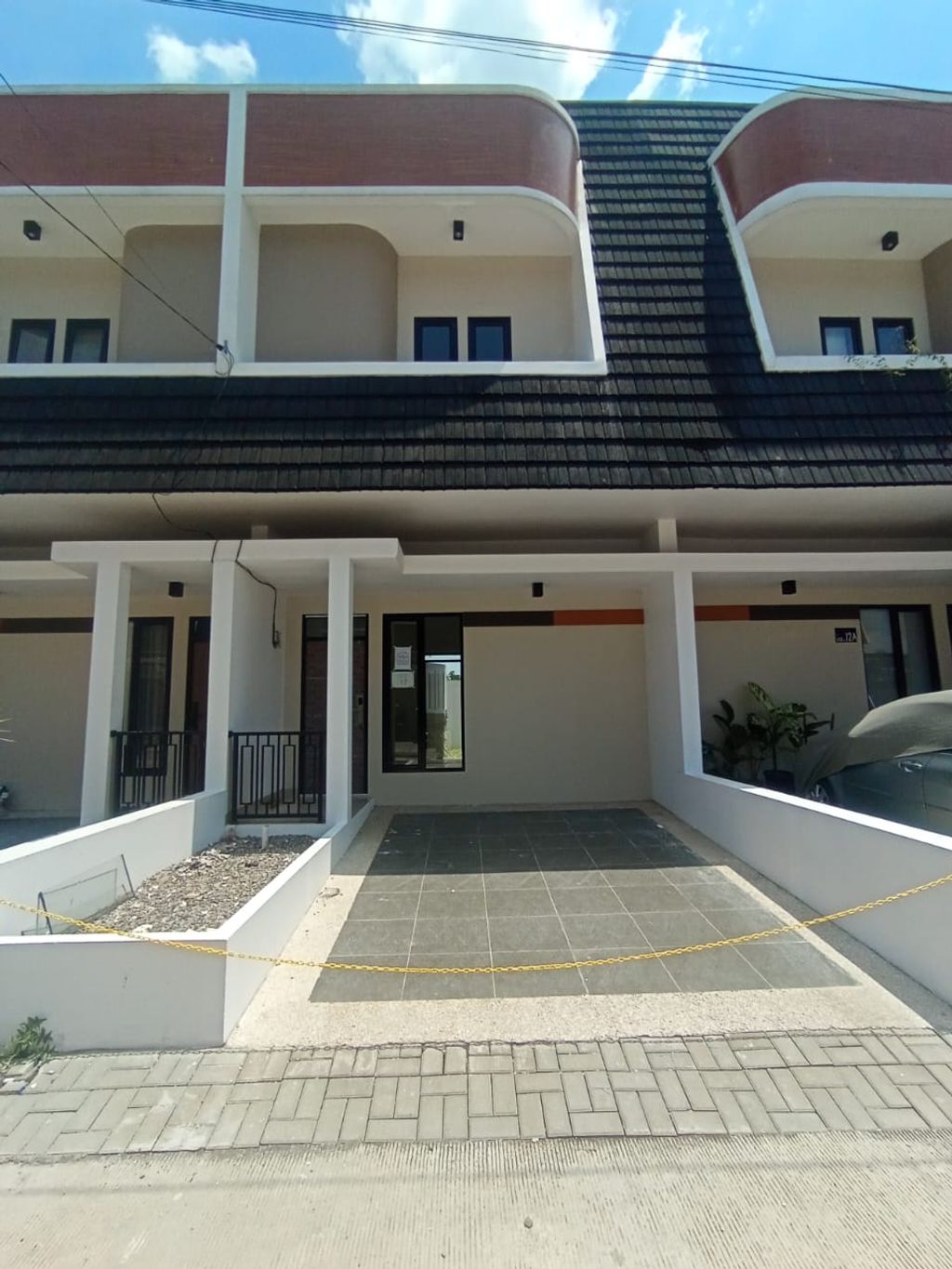 foto tampak rumah tipe 54 Compact 3 Kamar HC (608) perumahan G-Land Ciwastra Park 2