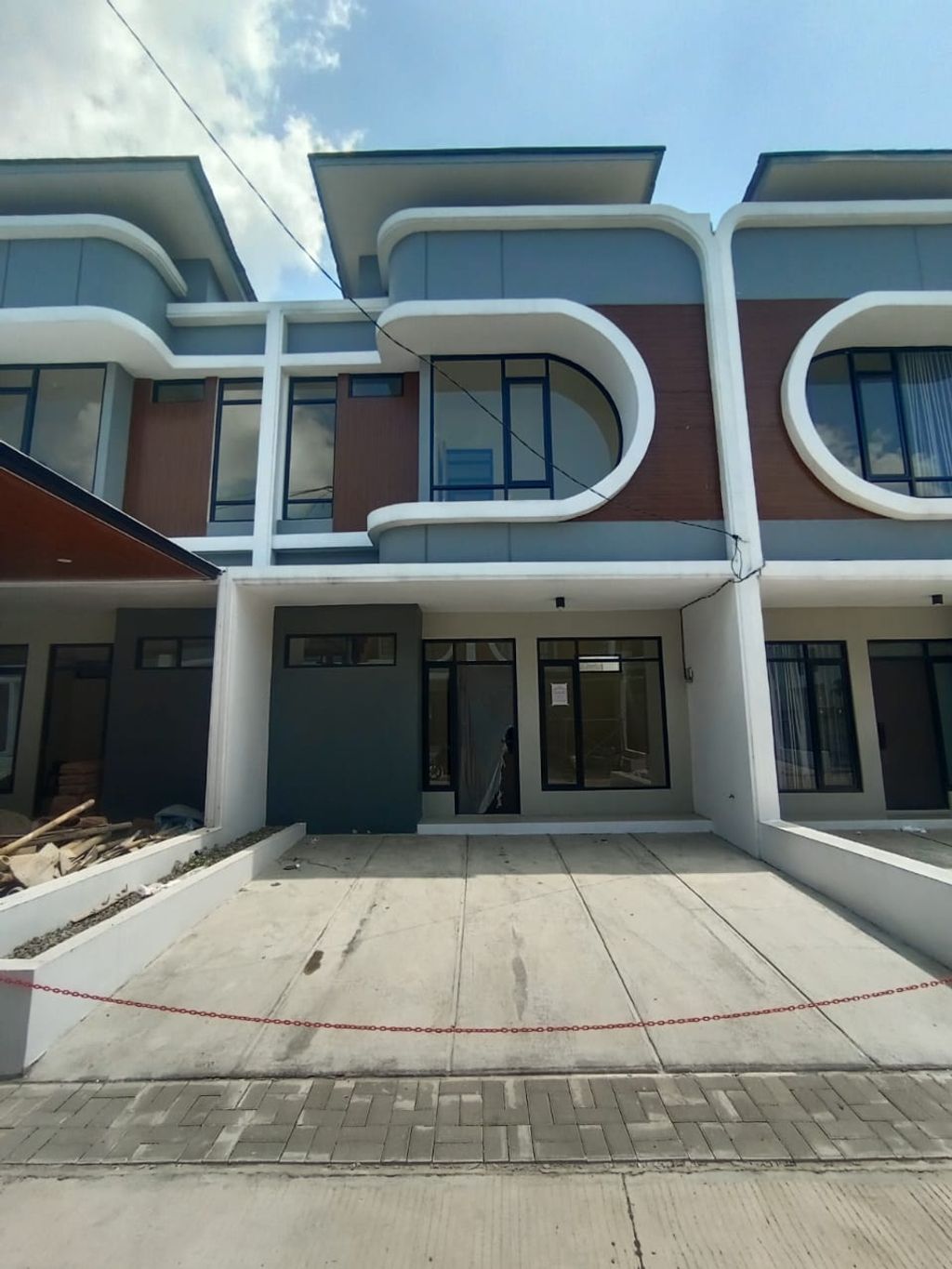 foto tampak rumah tipe 57 Compact High Ceiling (3KT) (593) perumahan G-Land Ciwastra Park 2