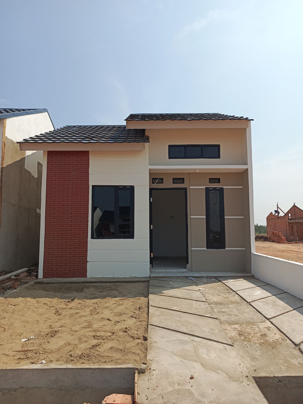 foto tampak rumah tipe RSH perumahan HARMONI RESIDENCE