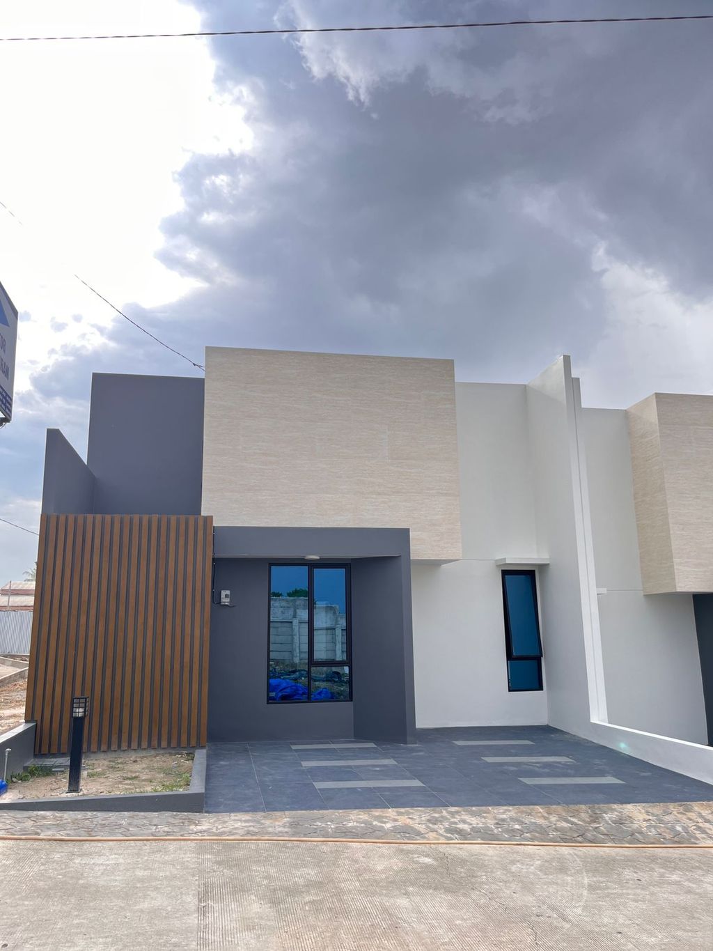 foto tampak rumah tipe T47 perumahan PURI INDAH PASAR BARU