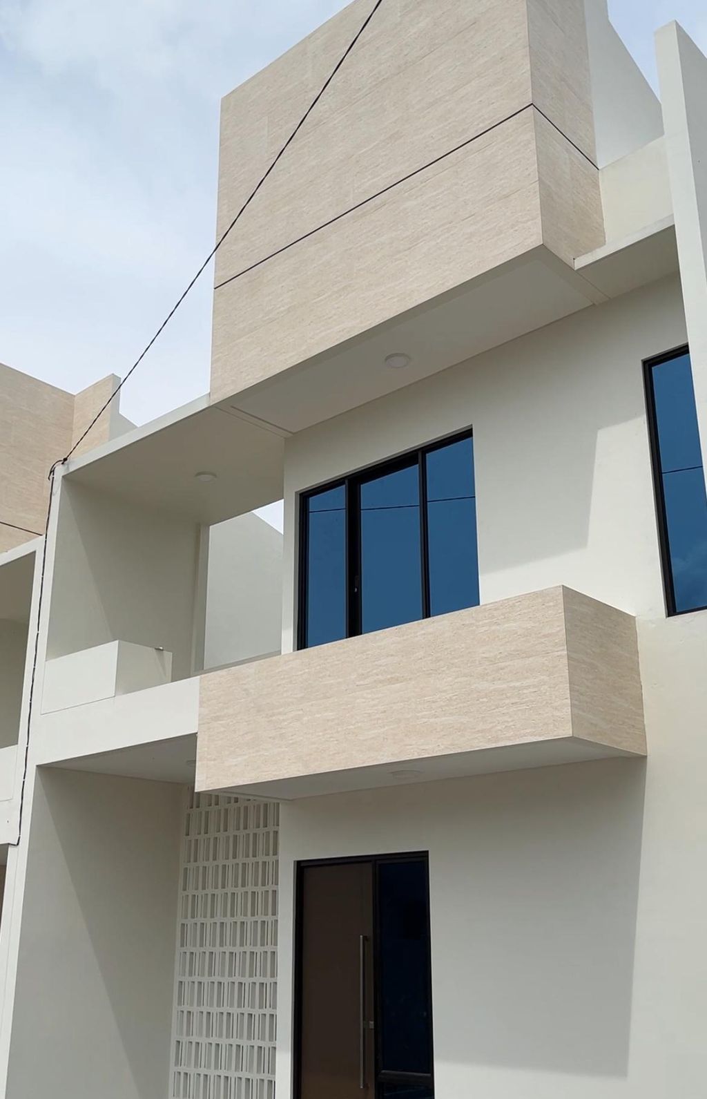 foto tampak rumah tipe T77 perumahan PURI INDAH PASAR BARU