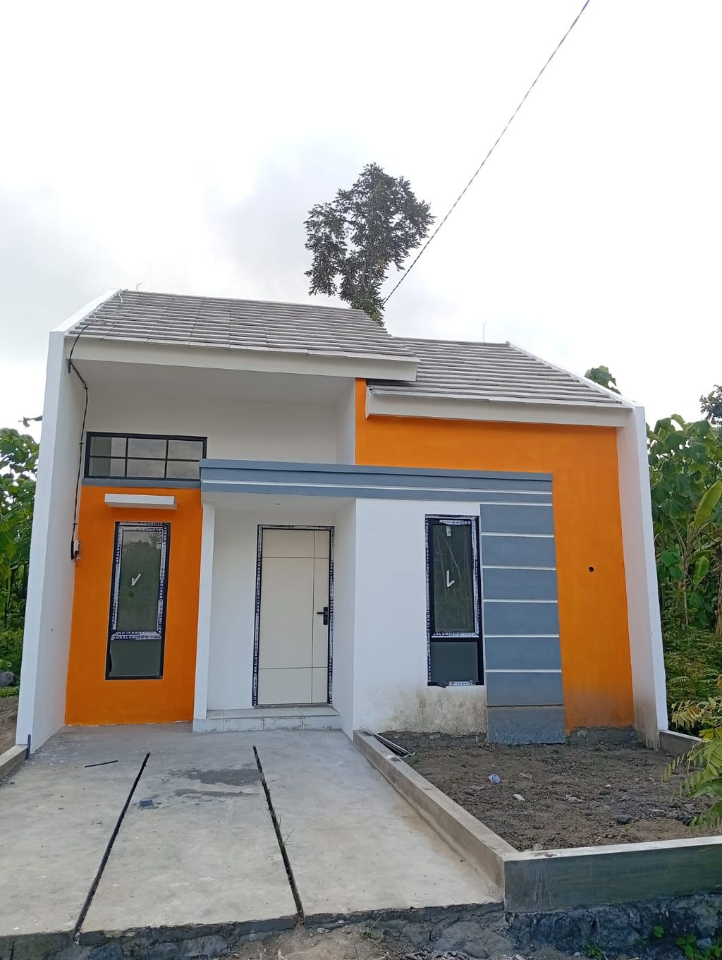 foto tampak rumah tipe 30/60 perumahan ALAM HARMONI TUKUM