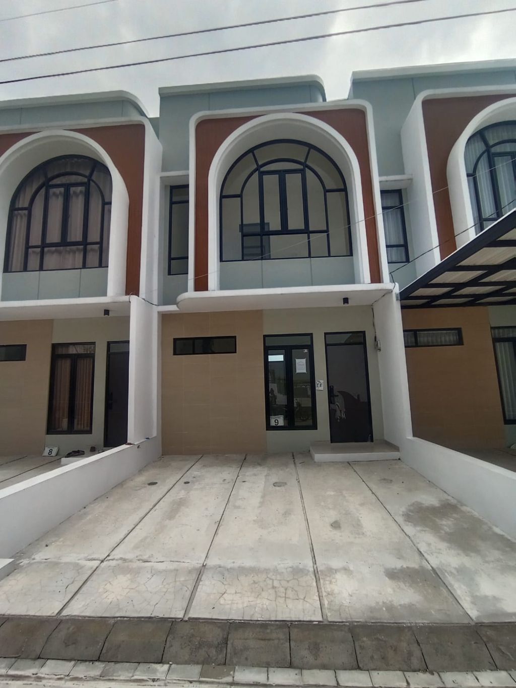 foto tampak rumah tipe 50 Compact 3 Kamar HC (522) perumahan G-Land Ciwastra Park 2