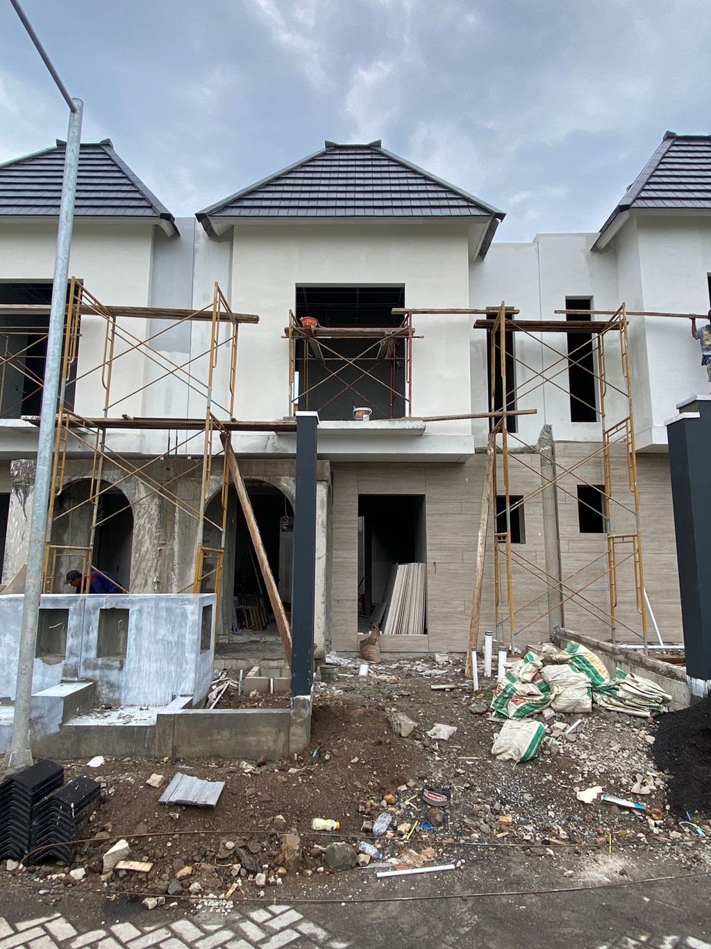 foto tampak rumah tipe CLUSTER PALAIS F6-11 perumahan Opra City