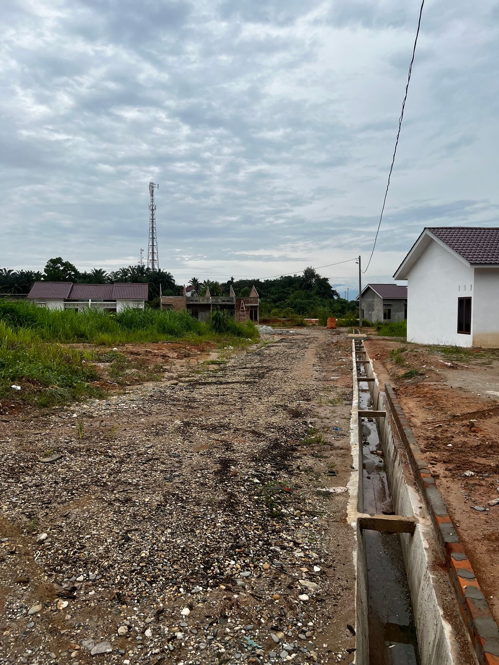 foto posisi tengah perumahan PUTRA RAJA