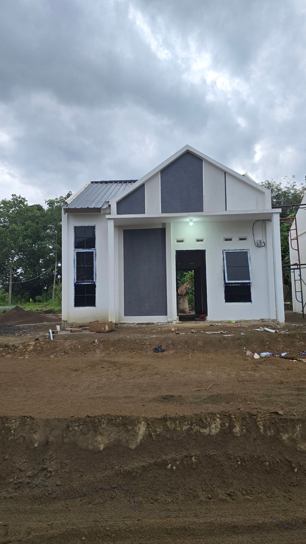 foto contoh rumah perumahan Family Land 3