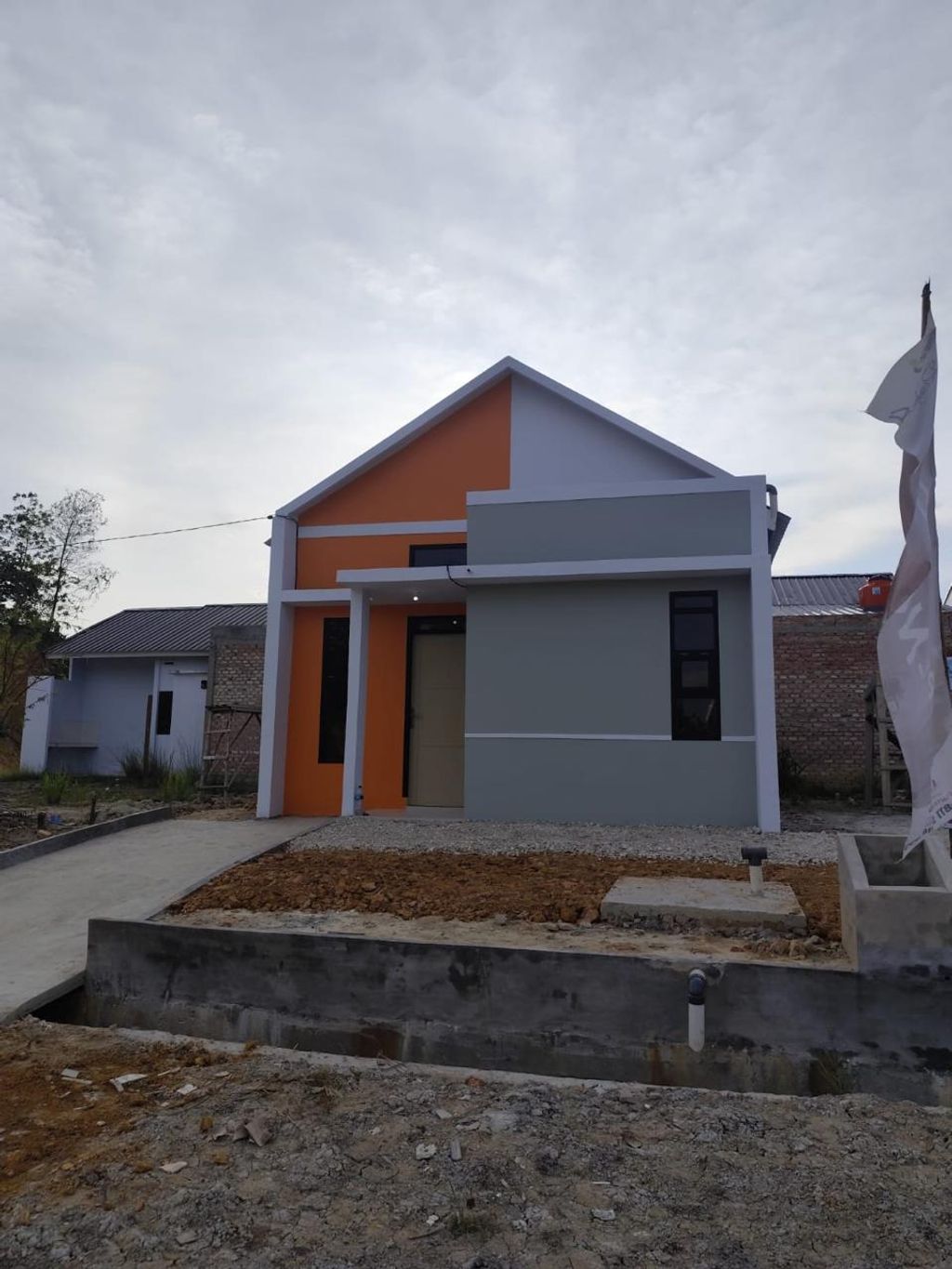 foto tampak rumah tipe 36 PMK 60/2023 perumahan RUMBAI RESIDENCE 4