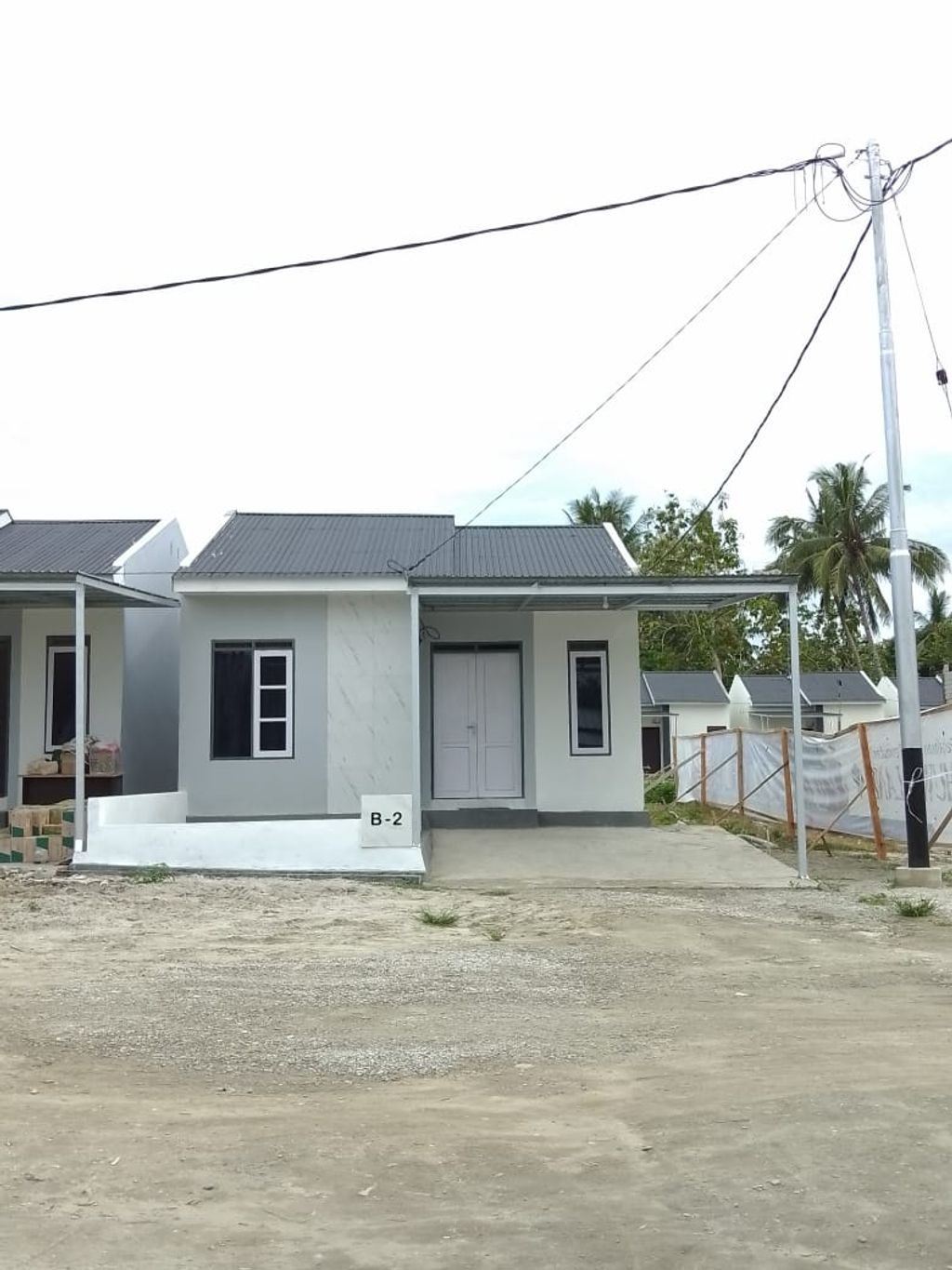 foto tampak rumah tipe 36 perumahan UKHUWAH LAND TINGGEDE