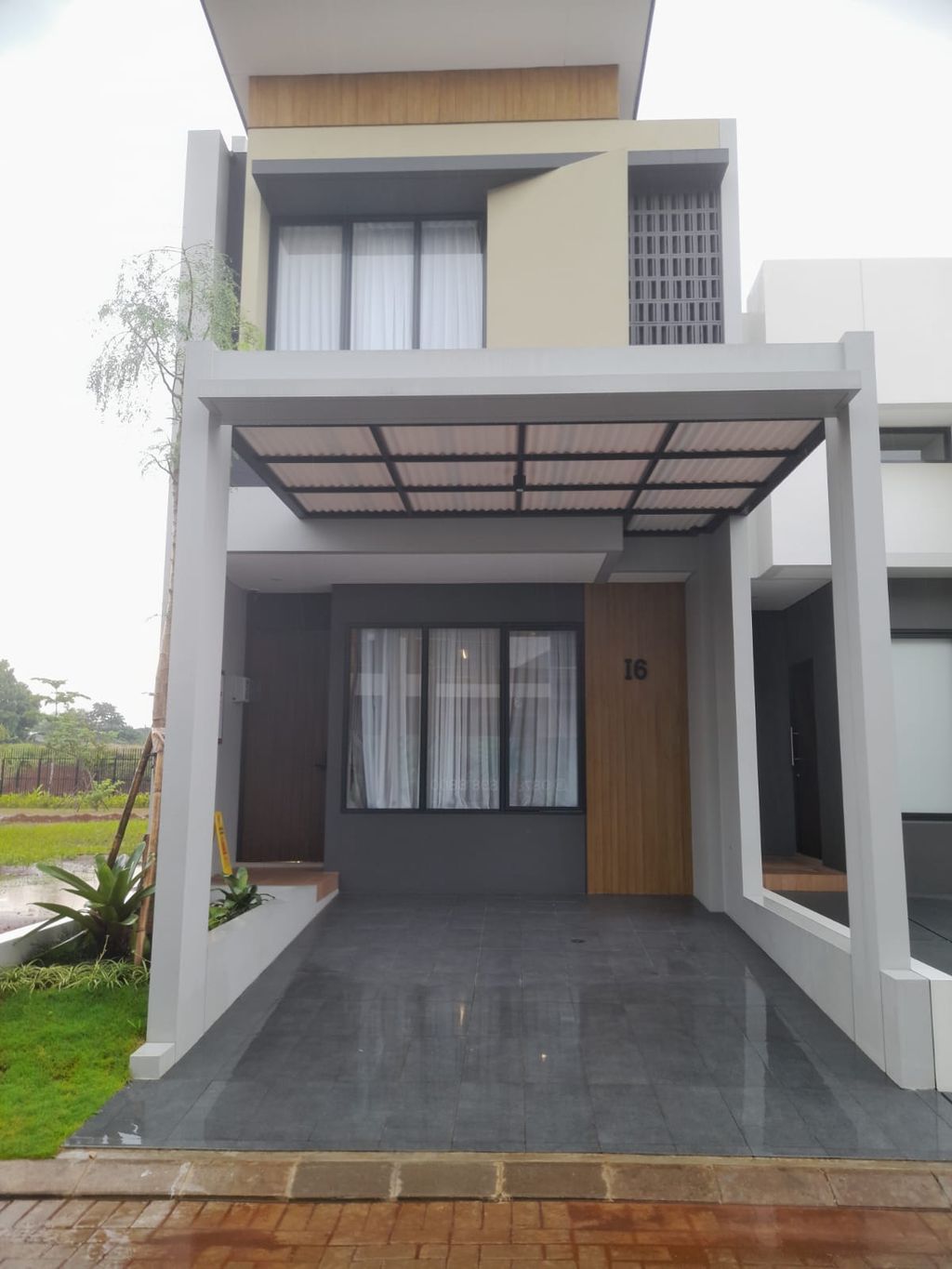 foto tampak rumah tipe Edelweiss perumahan Premier Promenade