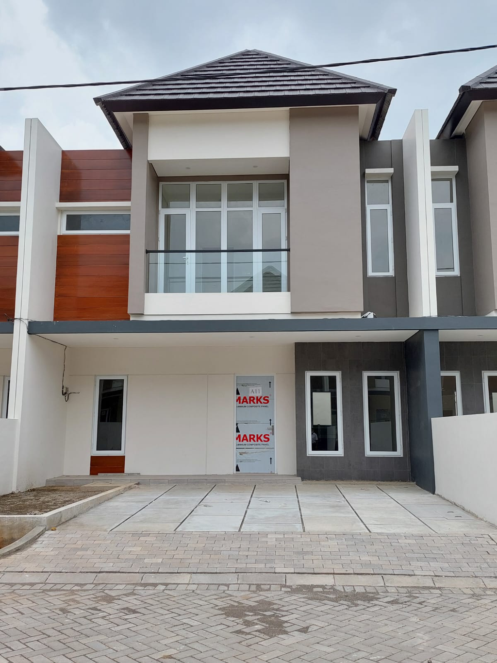 foto tampak rumah tipe 100/150 perumahan MUTIARA ARTERI REGENCY