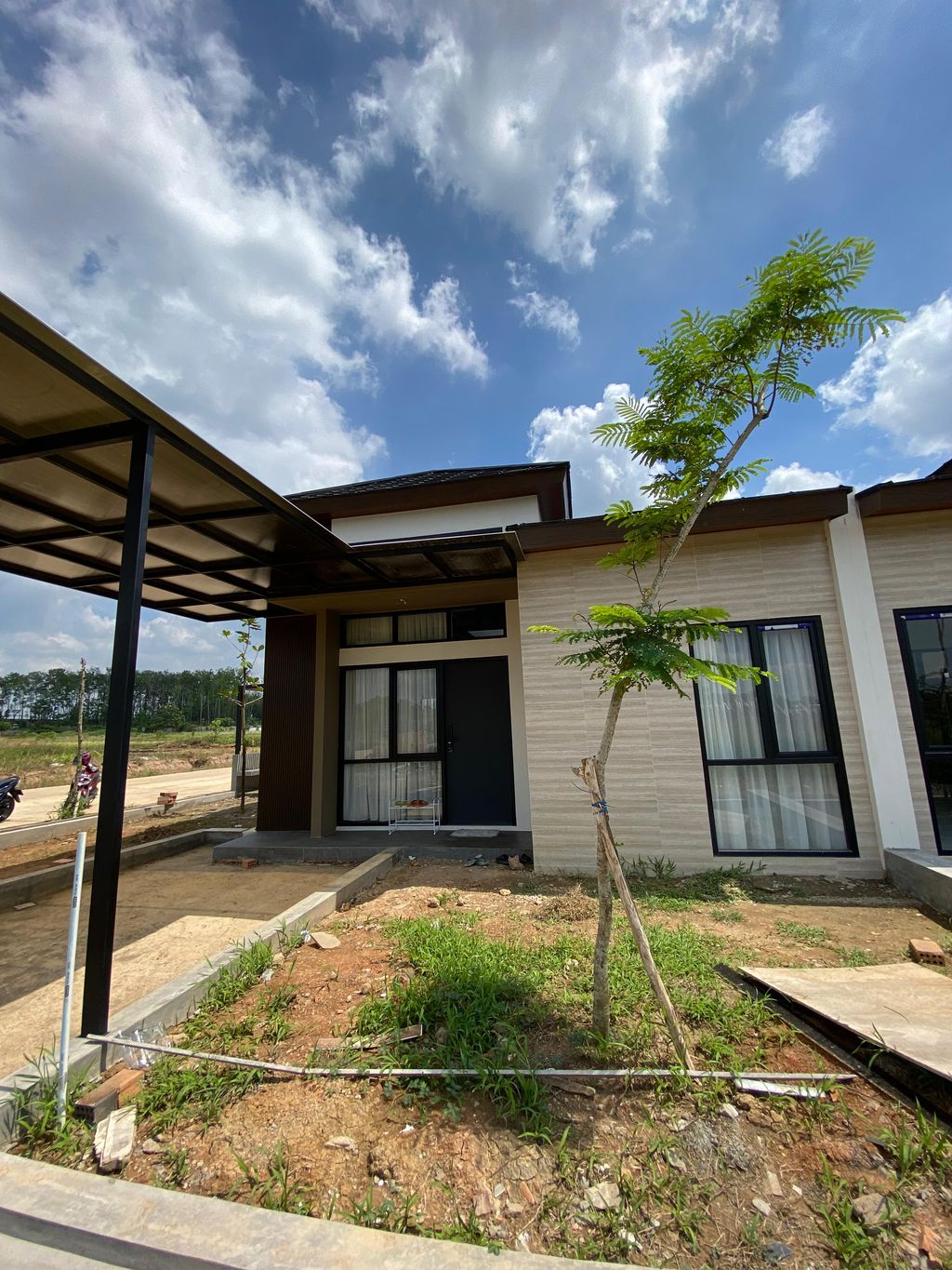 foto tampak rumah tipe AKASIA STANDARD perumahan BOTANICA RESIDENCE