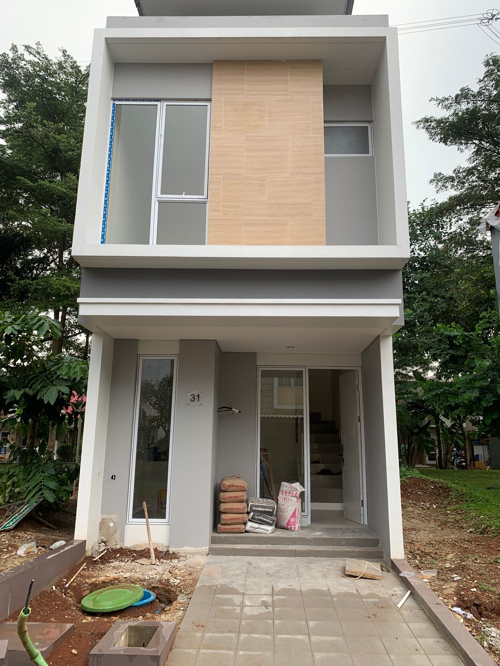 foto tampak rumah tipe GLENWOOD/31 perumahan Cluster Virginia Village dan Bermuda