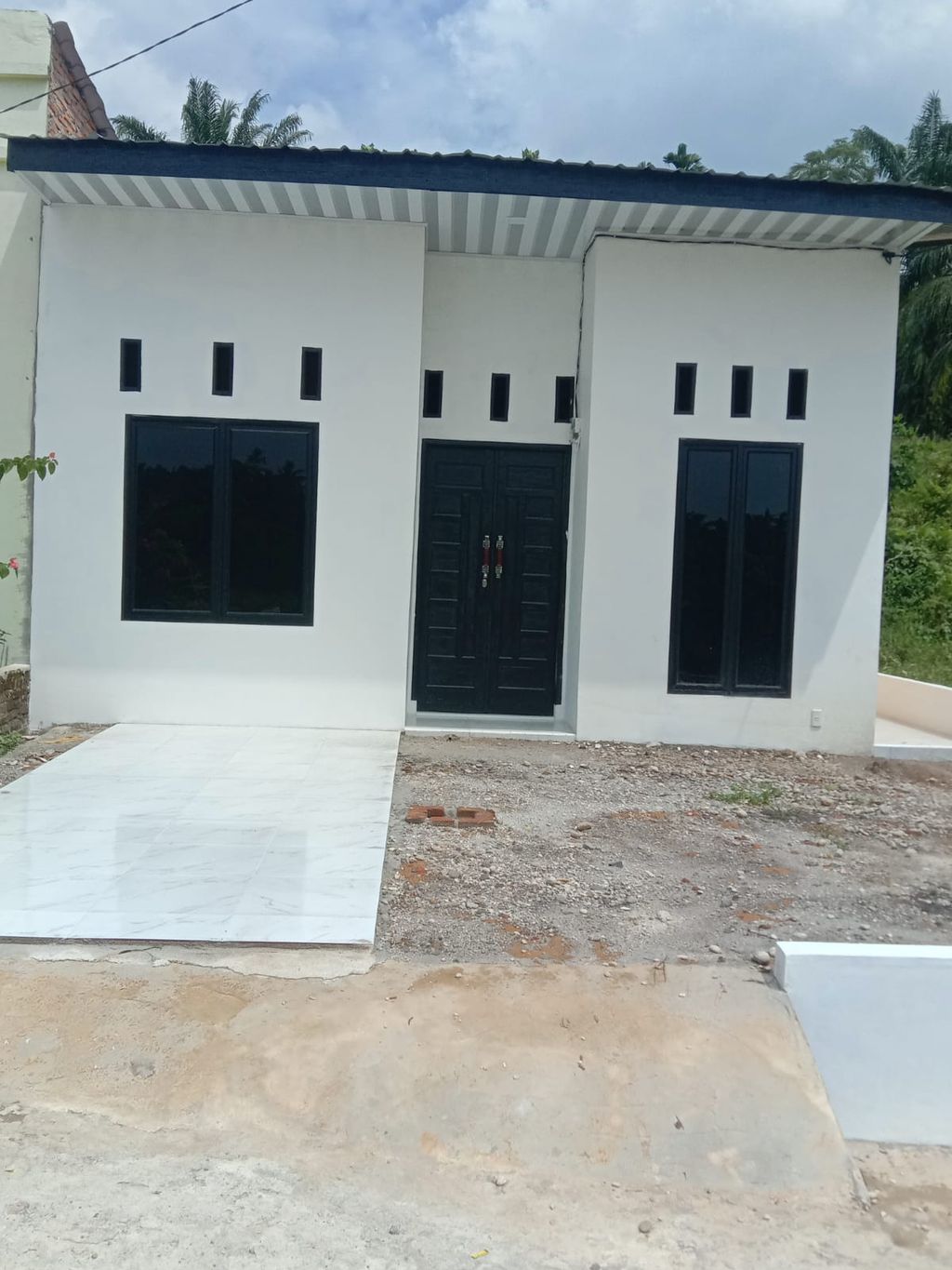 foto gerbang perumahan Taman Wisma Asri