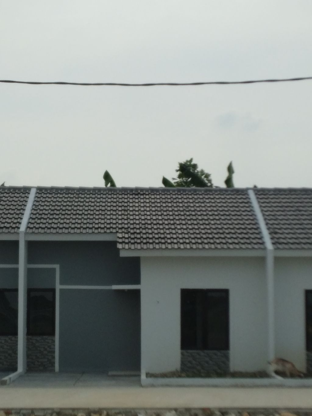 foto tampak rumah tipe Blok E No.7 perumahan Srijaya Indah Residence