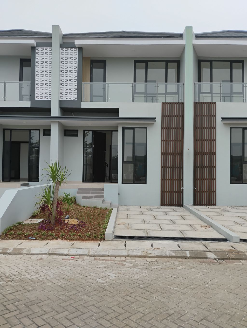 foto tampak rumah tipe JASMINE-D-18 perumahan Penta Garden