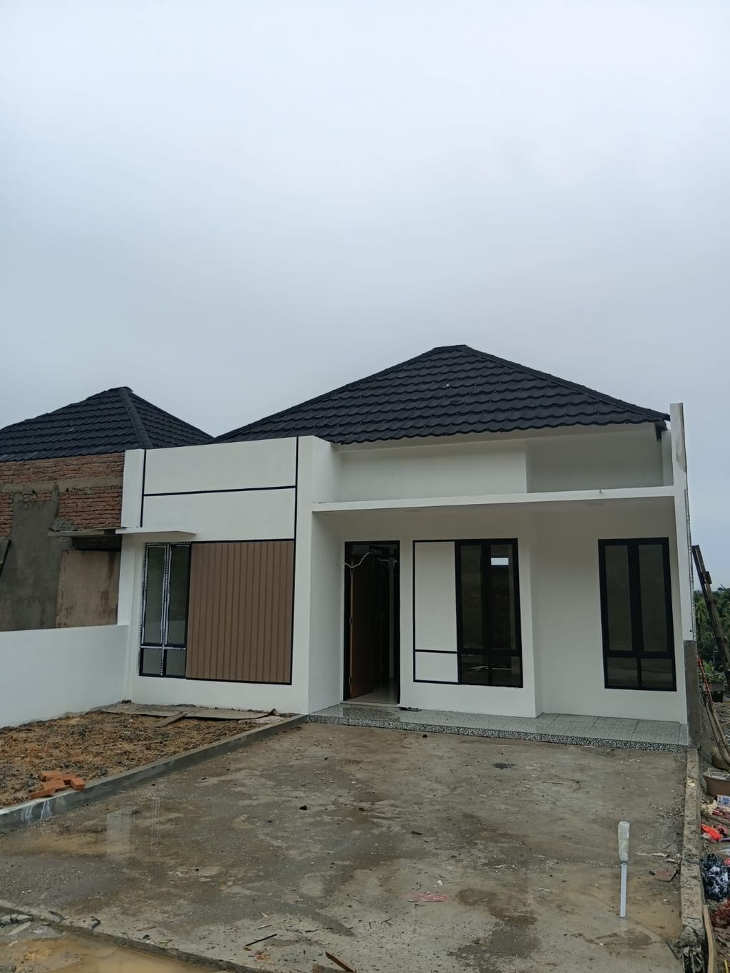 foto tampak rumah tipe 45/120 M² perumahan KINAYA HIGHLAND