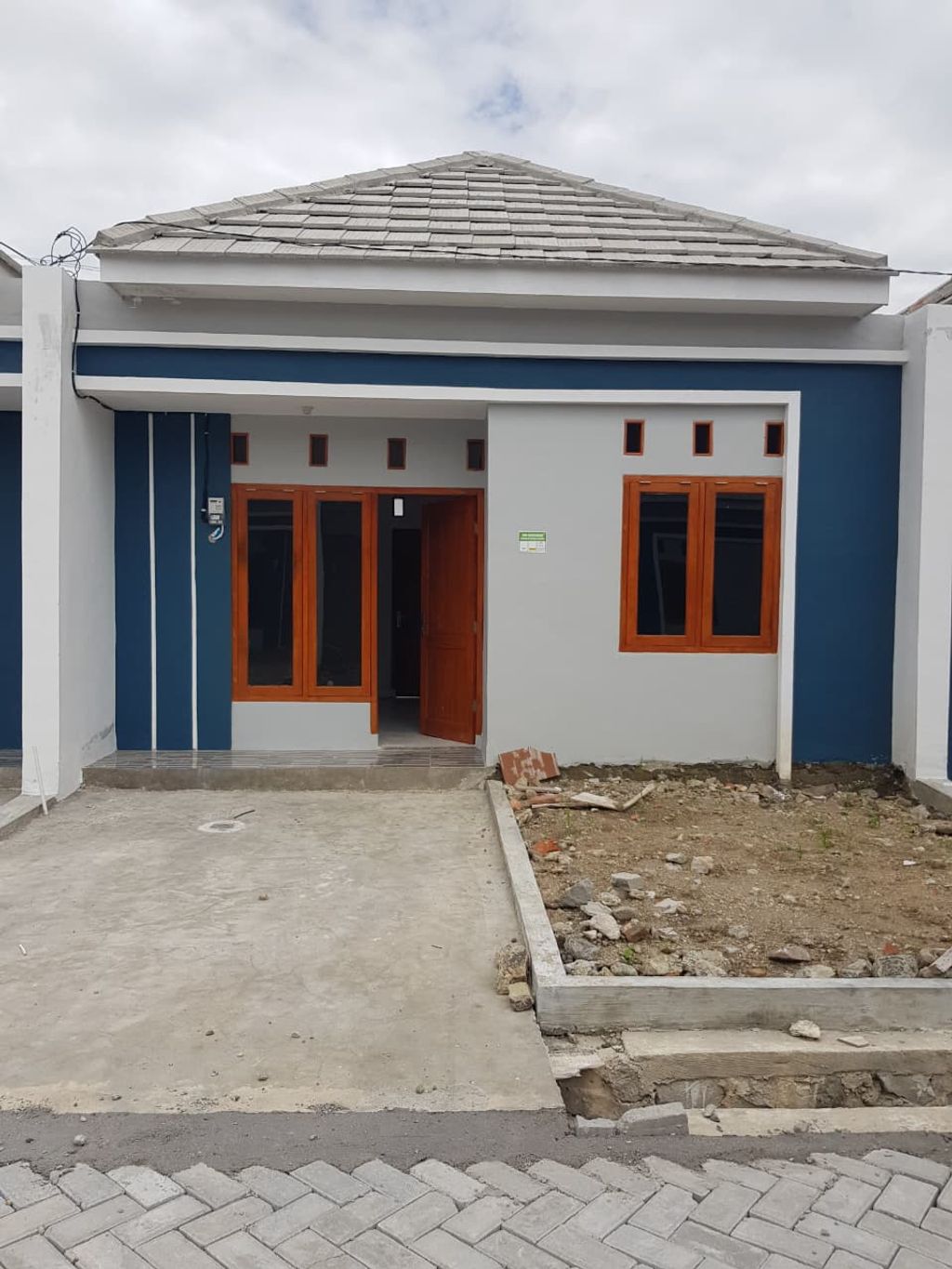foto tampak rumah tipe 30 perumahan GRIYA MANDIRA VILLAGE 5