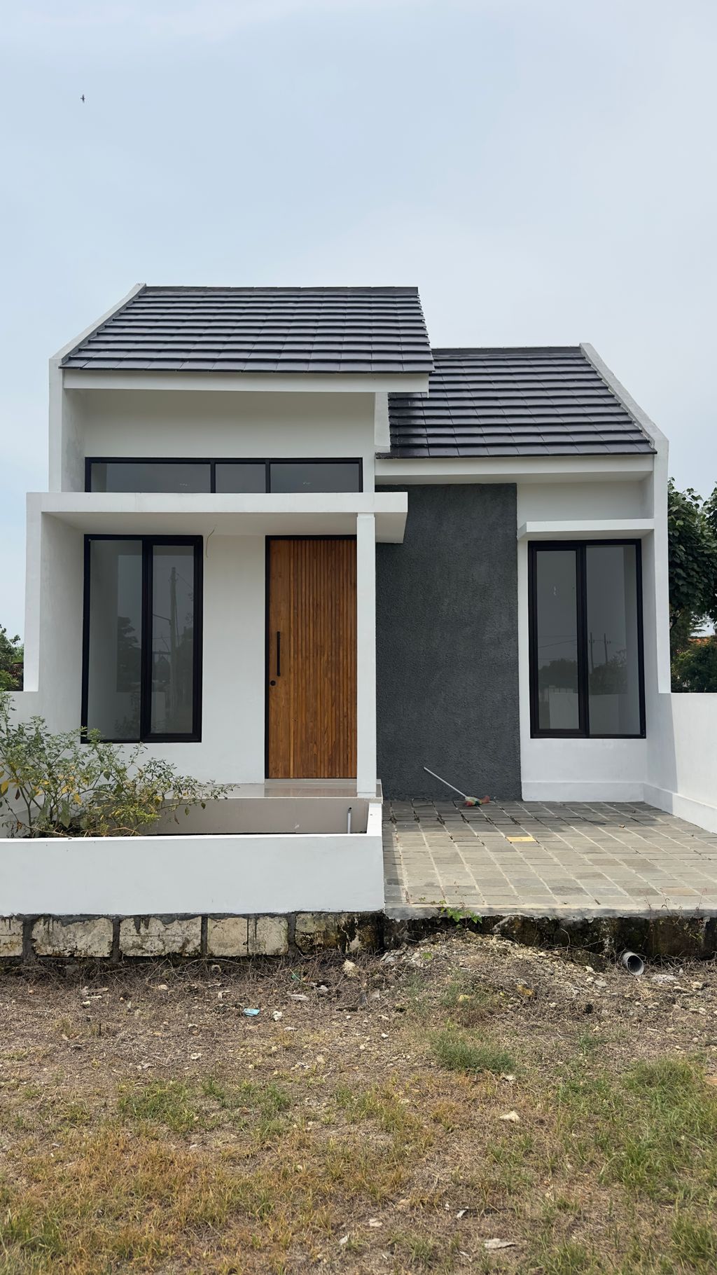 foto tampak rumah tipe Marigold 30/60 perumahan GRAND WASTANA RESIDENCE