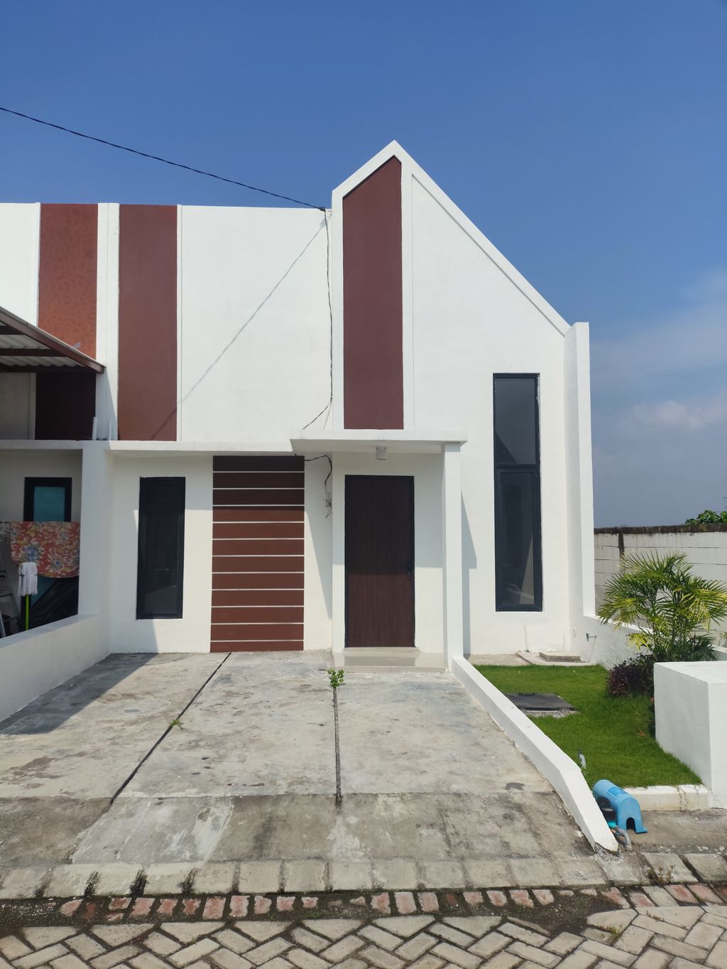 foto tampak rumah tipe THE WISE NON STANDART 18 perumahan THE OSO 2