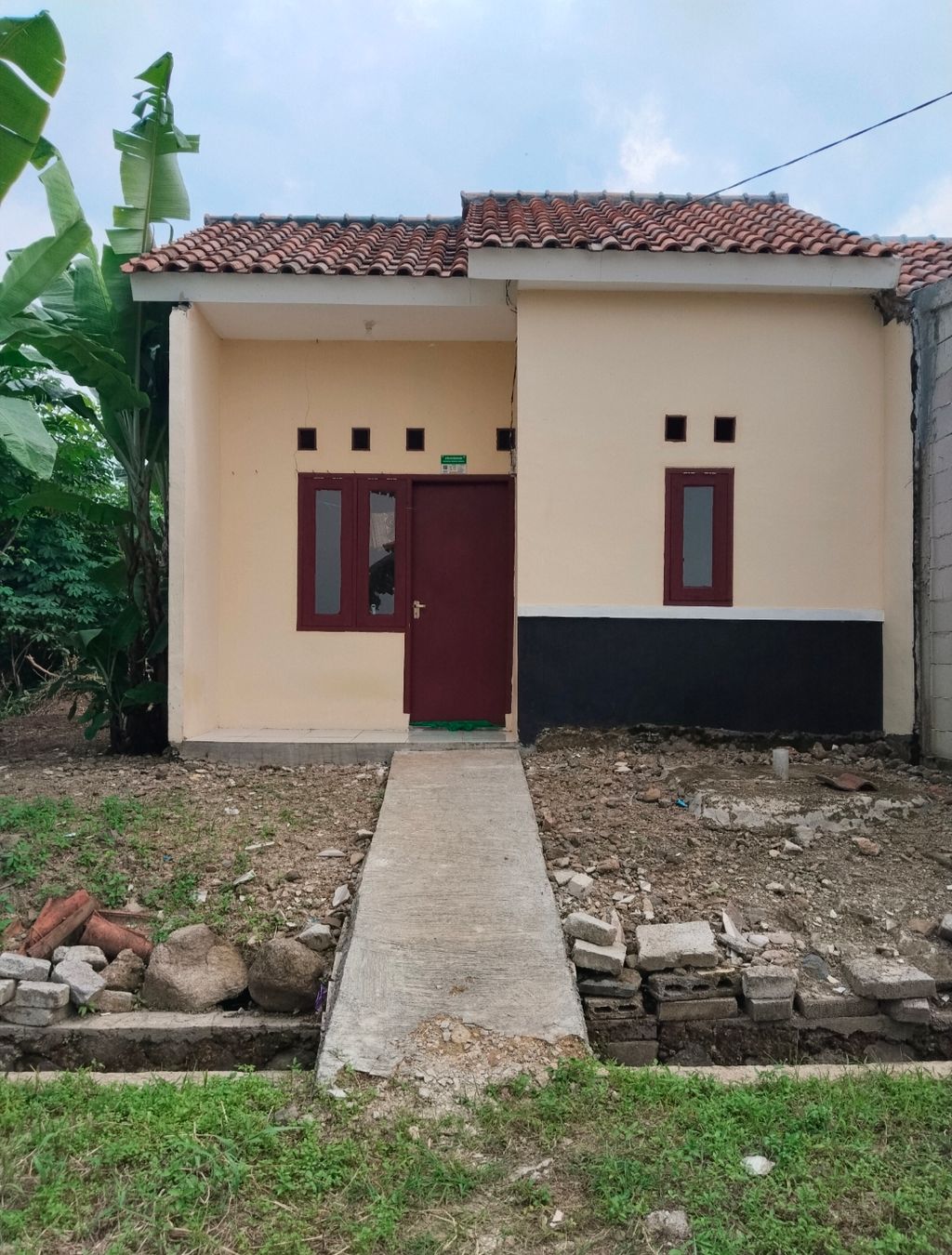 foto tampak rumah tipe 27/60 M2 perumahan TAMANSARI PERMAI 2