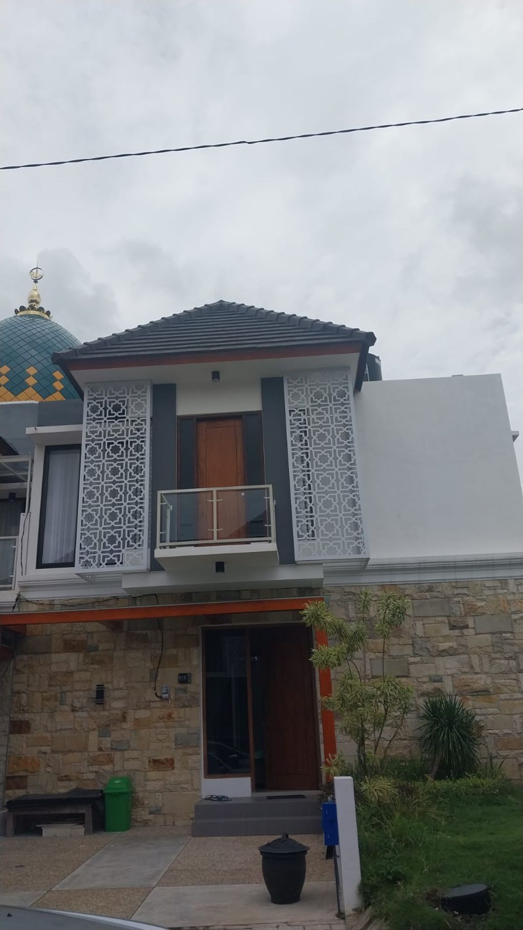 foto tampak rumah tipe UMAR perumahan ADYNA RESIDENCE